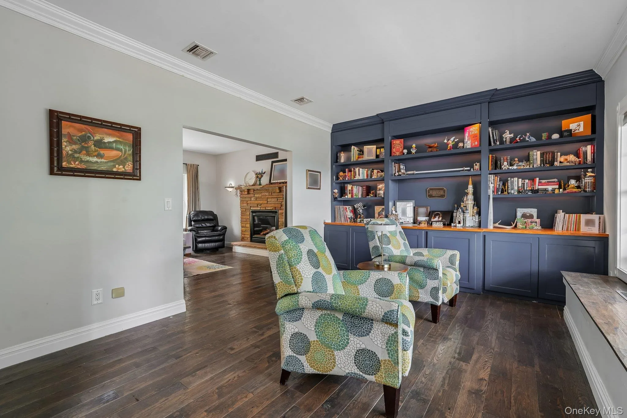 With custom built in bookcase and new floors With custom built in bookcase and new floors