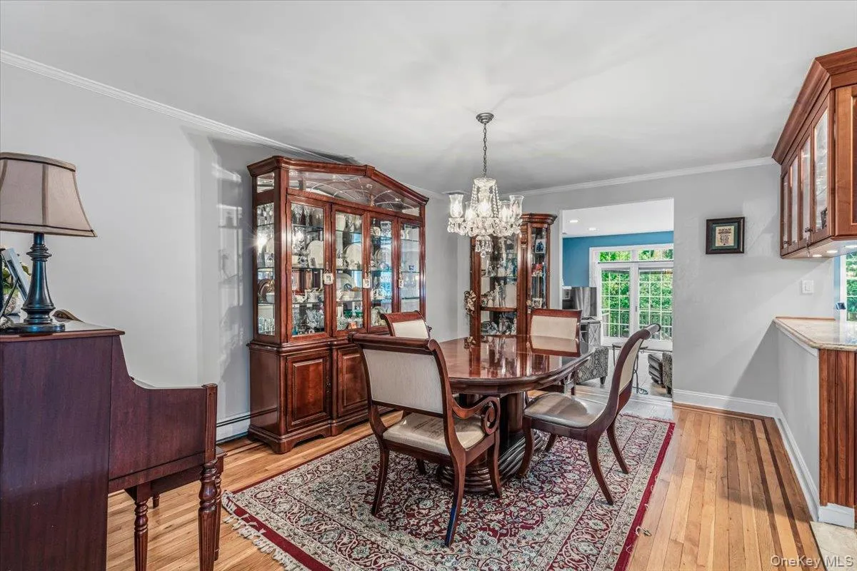 Formal Dining Room with view to Family Room Formal Dining Room with view to Family Room