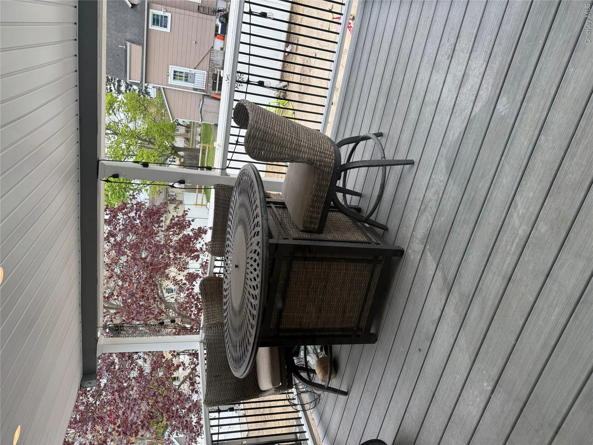 Covered outdoor deck featuring composite flooring Covered outdoor deck featuring composite flooring
