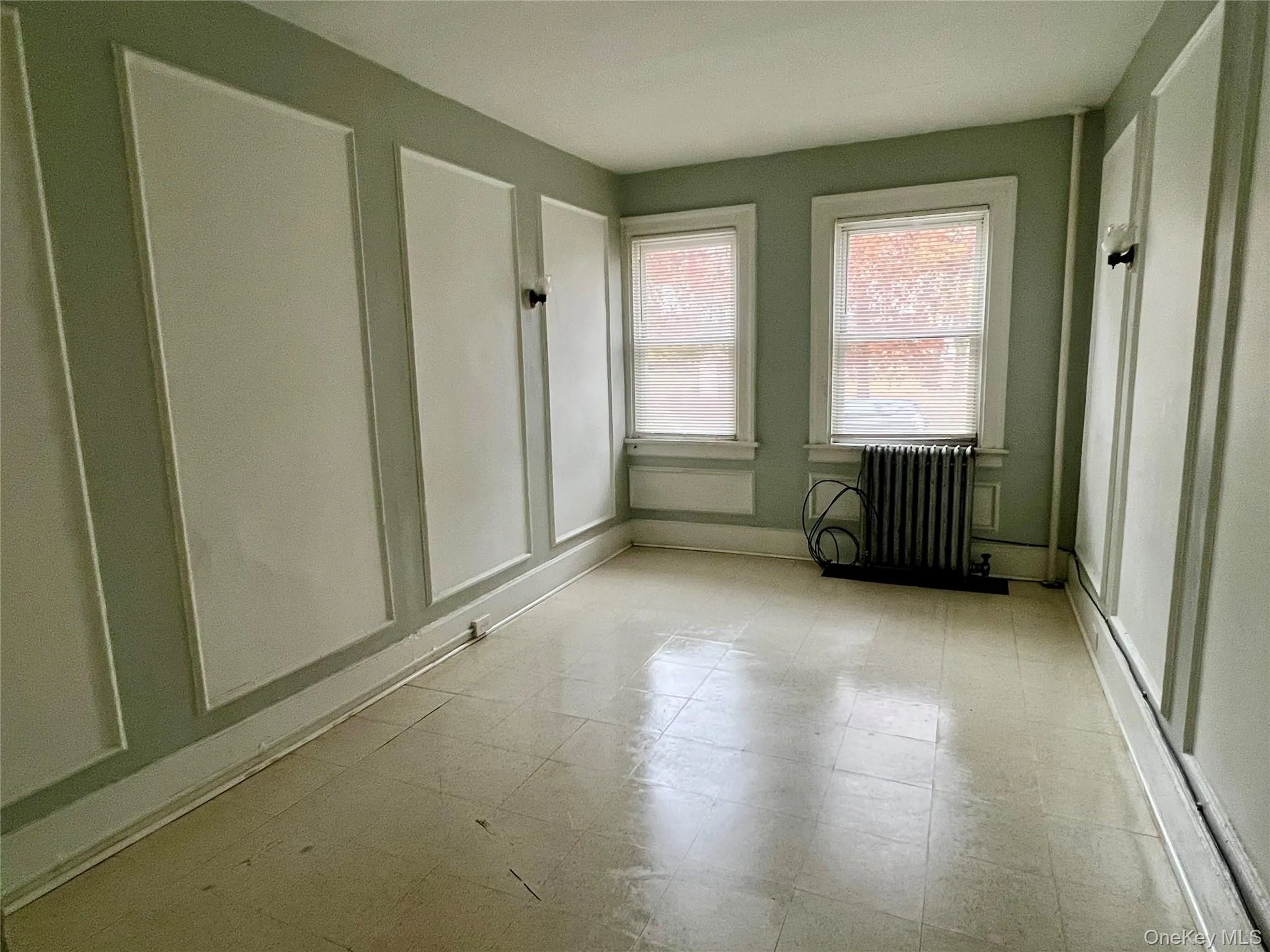 Unfurnished sunroom with radiator Unfurnished sunroom with radiator