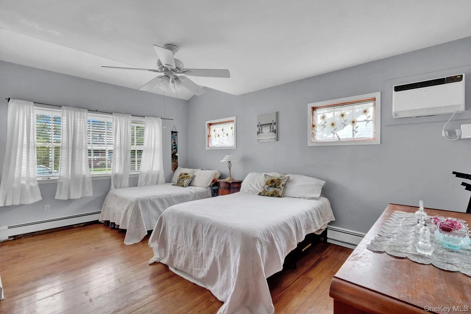 Large Primary Bedroom with Hardwood Floors12'10 x 10'4 Large Primary Bedroom with Hardwood Floors12'10 x 10'4