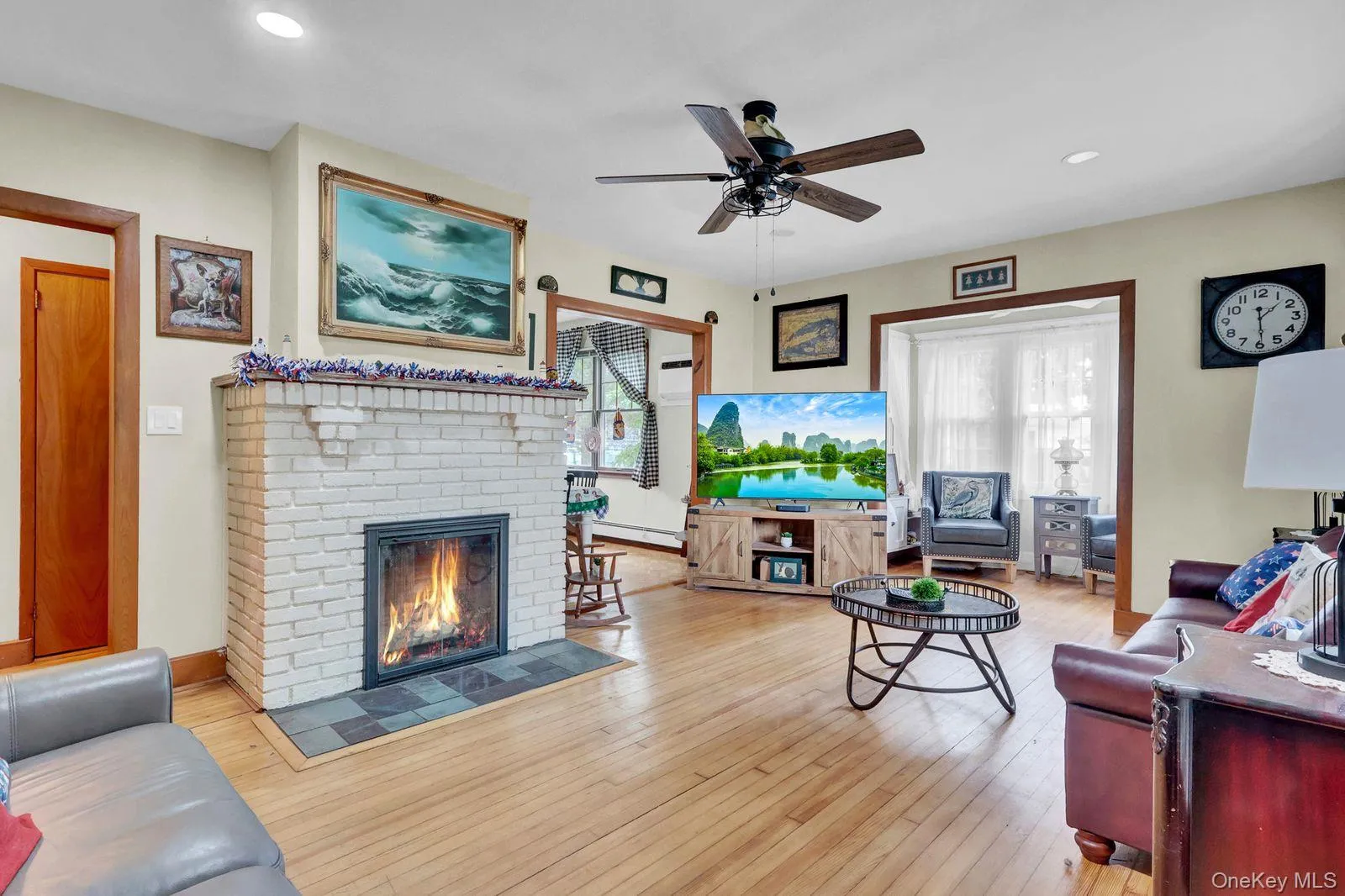 Livingroom with wood burning fireplace17'7 x 13'1 Livingroom with wood burning fireplace17'7 x 13'1