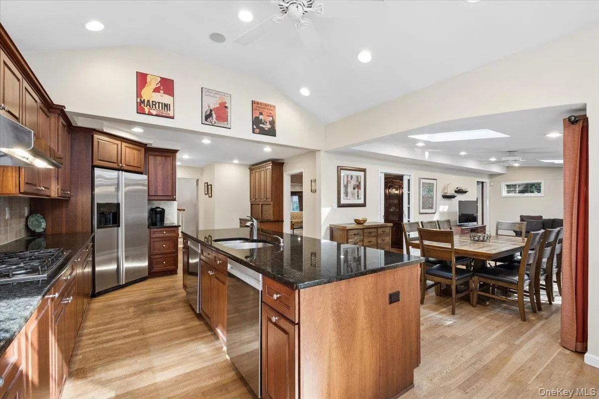 Gather around the kitchen island featuring two dishwashers Gather around the kitchen island featuring two dishwashers