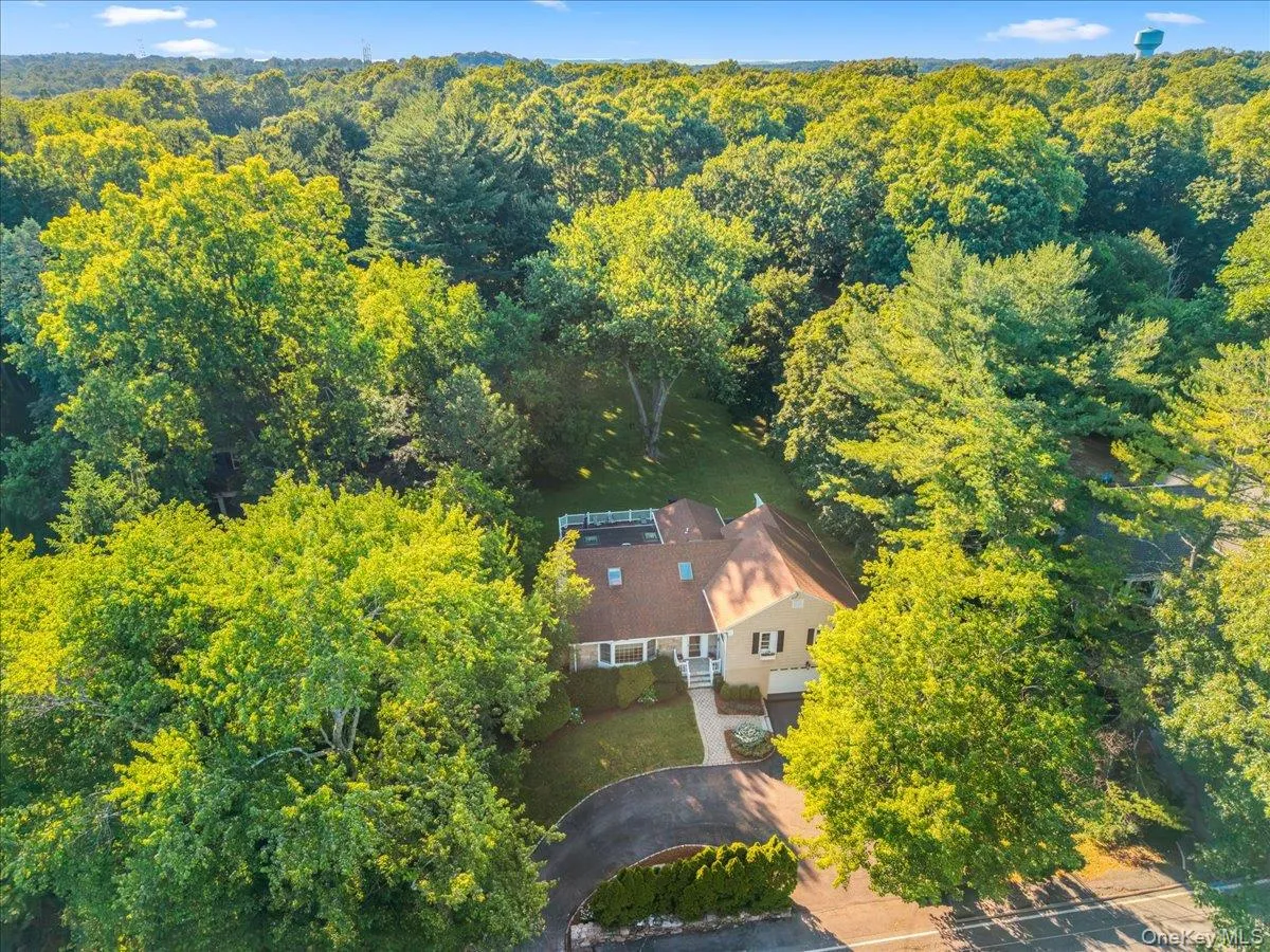 Aerial view of the house and stunning setting Aerial view of the house and stunning setting