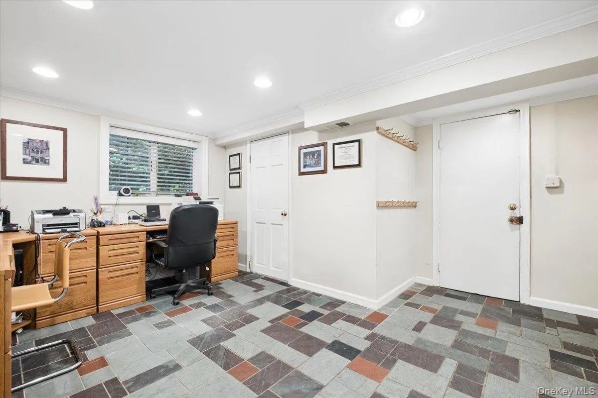 Spacious mudroom with access to laundry and garage Spacious mudroom with access to laundry and garage