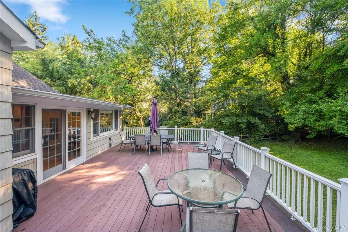 Enjoy hosting bbqs on the expansive deck overlooking the lushly landscaped private yard Enjoy hosting bbqs on the expansive deck overlooking the lushly landscaped private yard