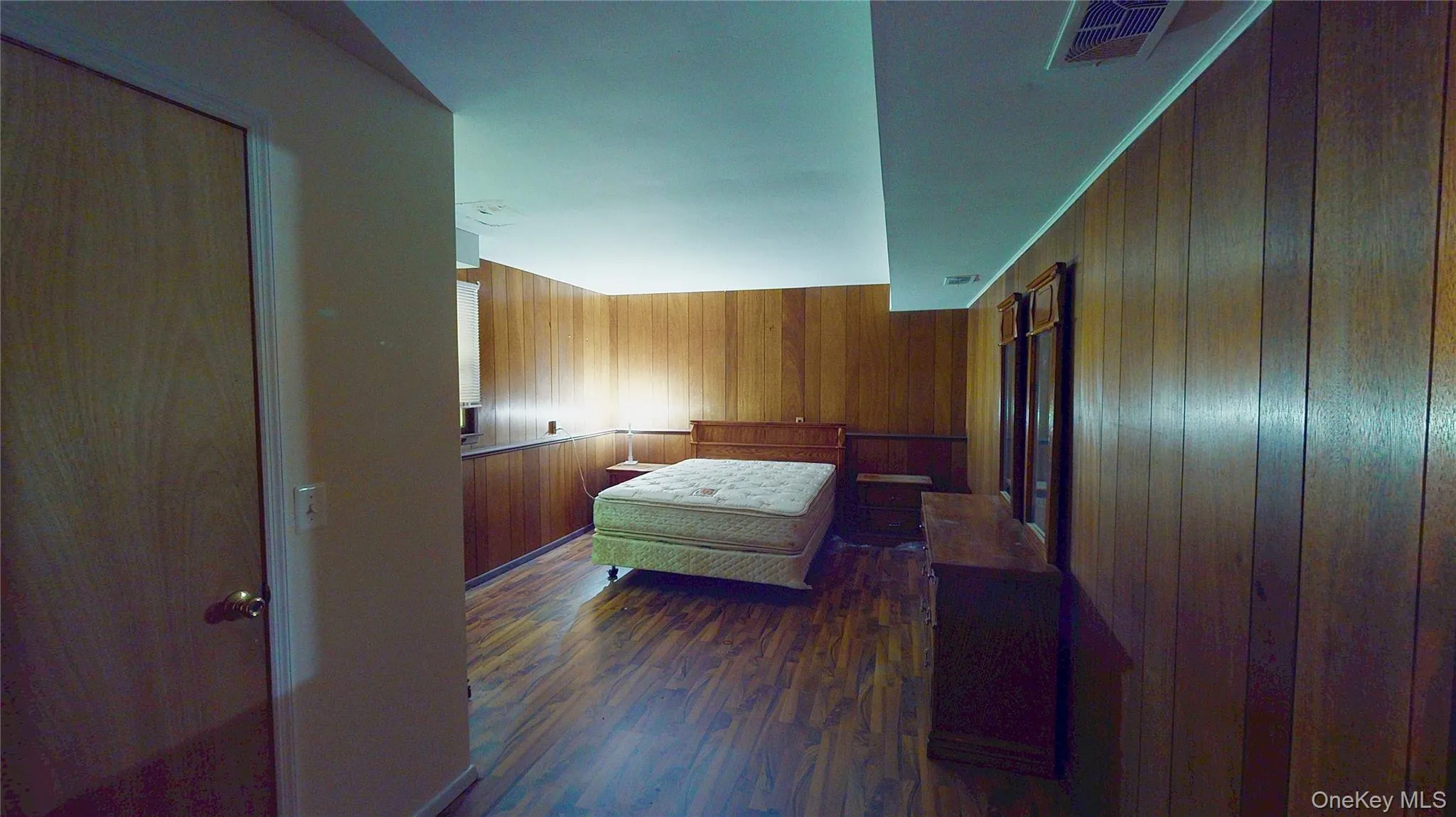 Spacious lower level bedroom with walk-in closet. Spacious lower level bedroom with walk-in closet.
