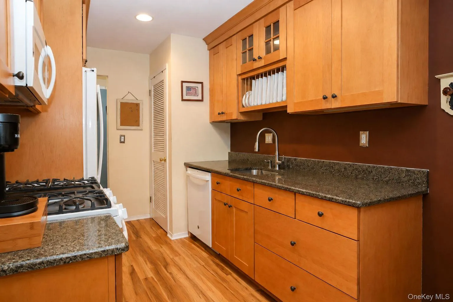 Updated Sleek Kitchen cabinets, granite counter under-cabinet lights Updated Sleek Kitchen cabinets, granite counter under-cabinet lights