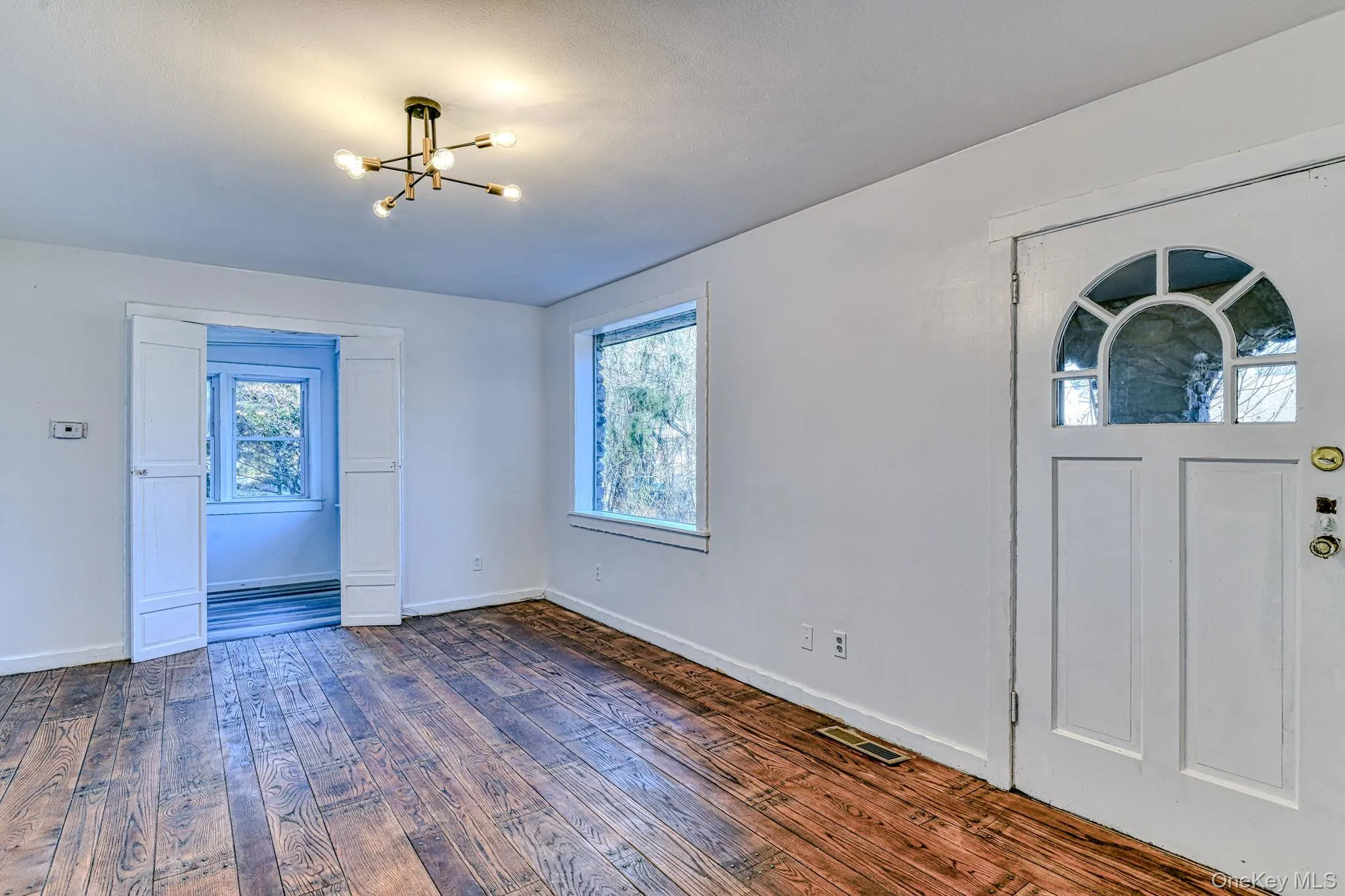 Foyer with wood flooring Foyer with wood flooring