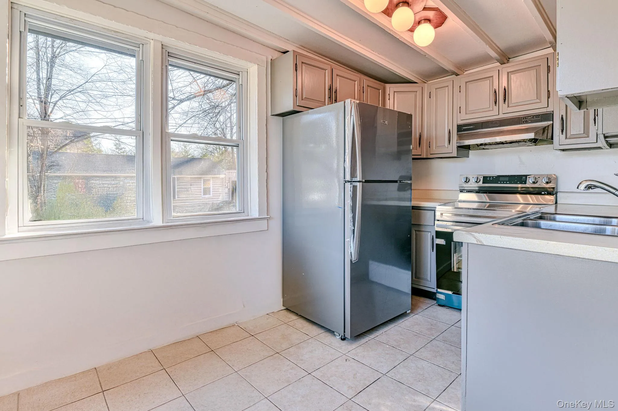 Eat in kitchen with stainless steel appliances Eat in kitchen with stainless steel appliances
