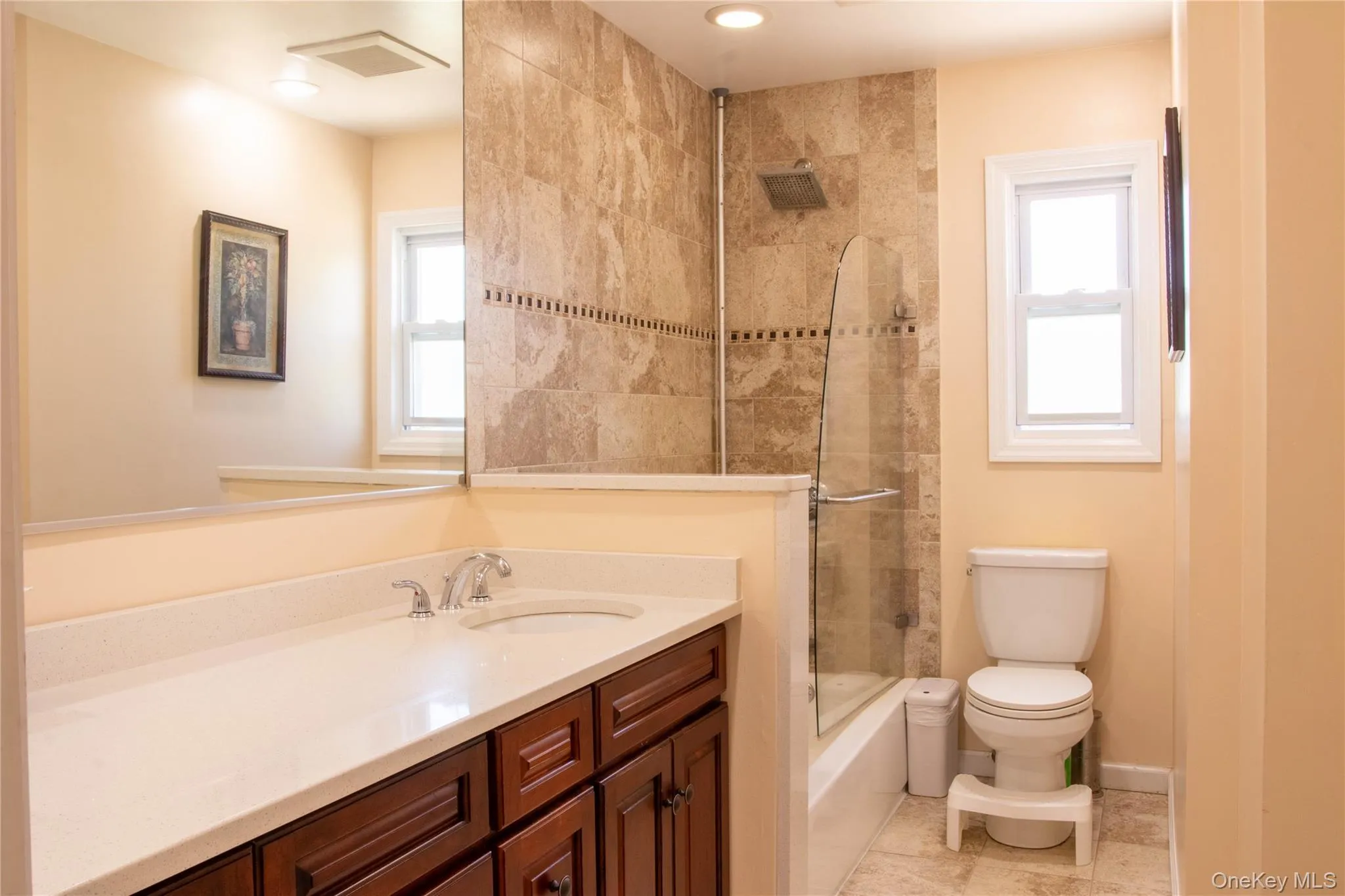 Updated Full Bathroom with Spacious Vanity and Counter Space View from Entrance Updated Full Bathroom with Spacious Vanity and Counter Space View from Entrance