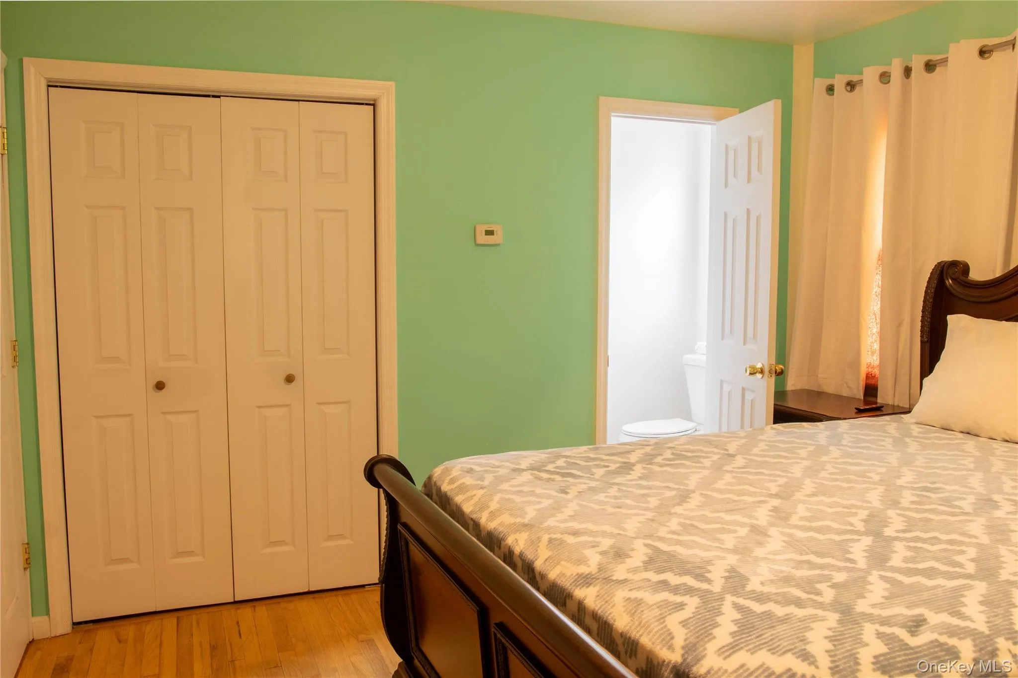 Primary Bedroom with Closet Space and Ensuite Bathroom Primary Bedroom with Closet Space and Ensuite Bathroom