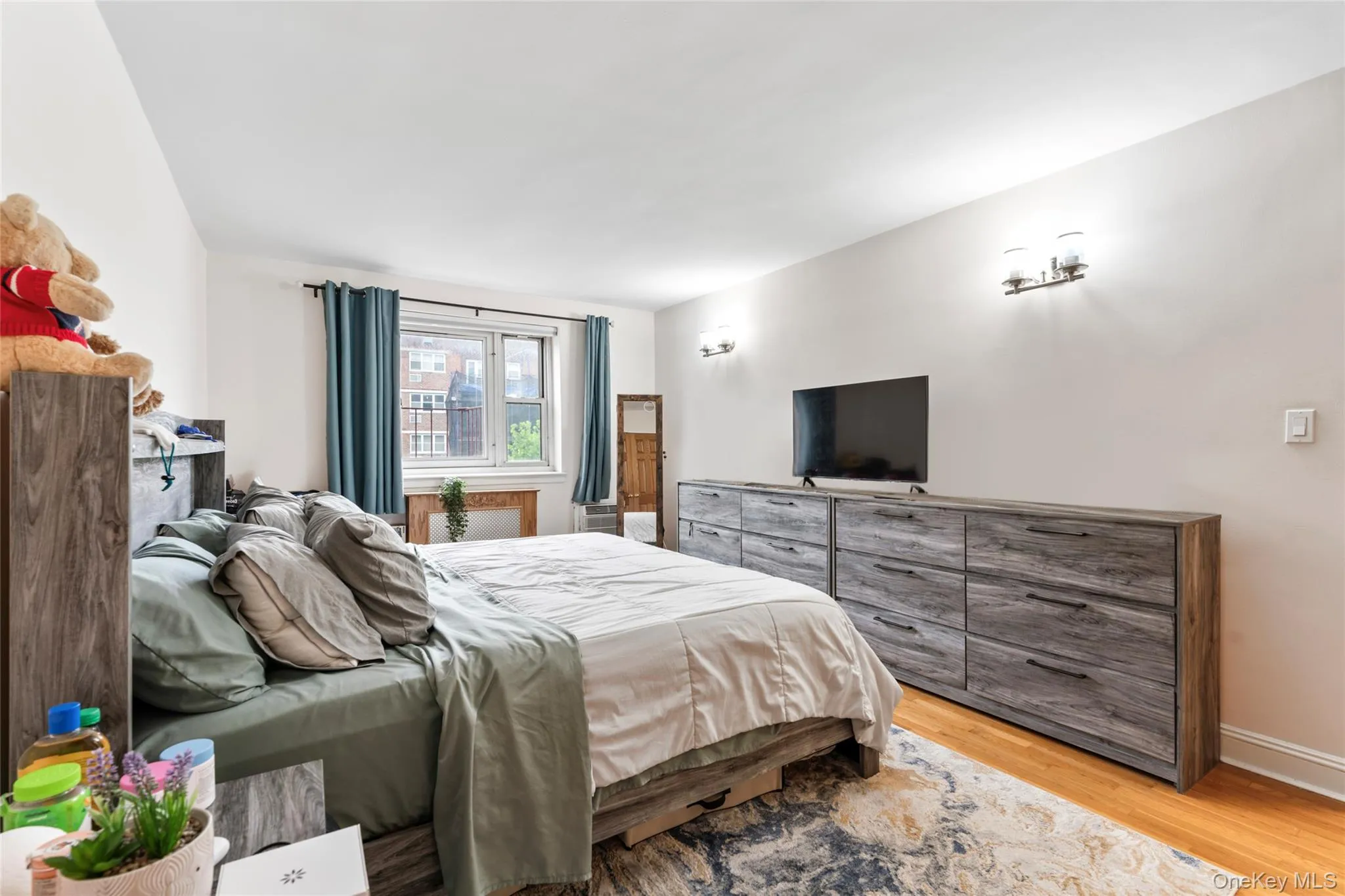 Bedroom featuring light wood-style floors Bedroom featuring light wood-style floors