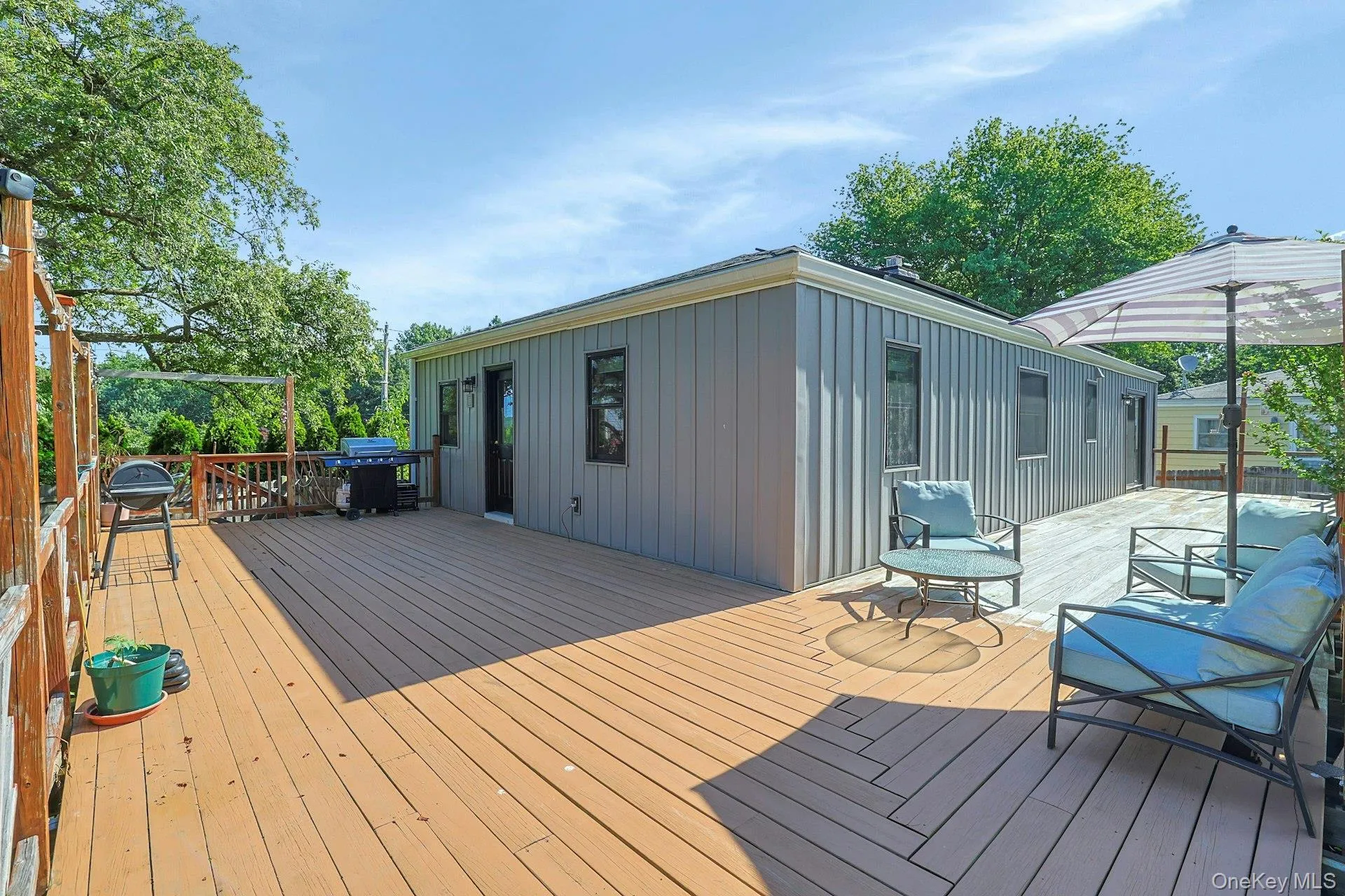 Back of Home with Wrap Around Deck Back of Home with Wrap Around Deck