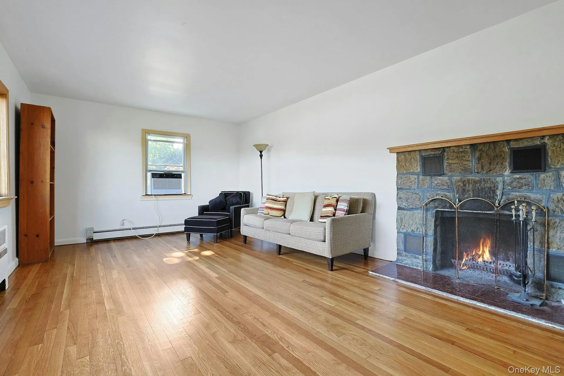 Living Room with Stone Fireplace Living Room with Stone Fireplace