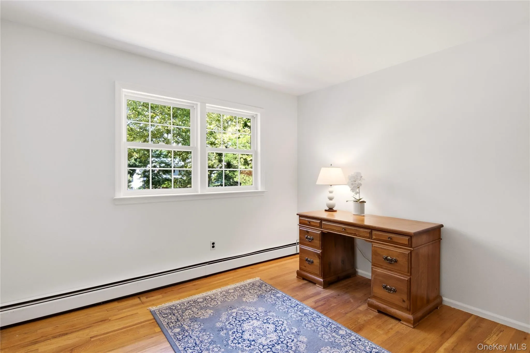 Second floor 2 nd bedroom with wood flooring Second floor 2 nd bedroom with wood flooring