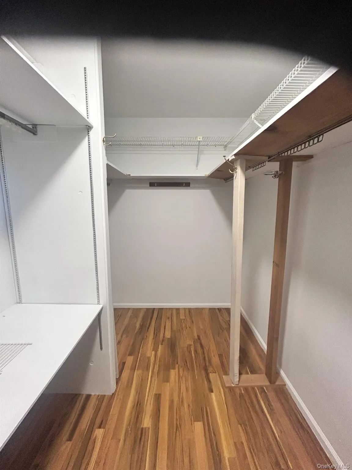 Primary walk in closet Primary walk in closet