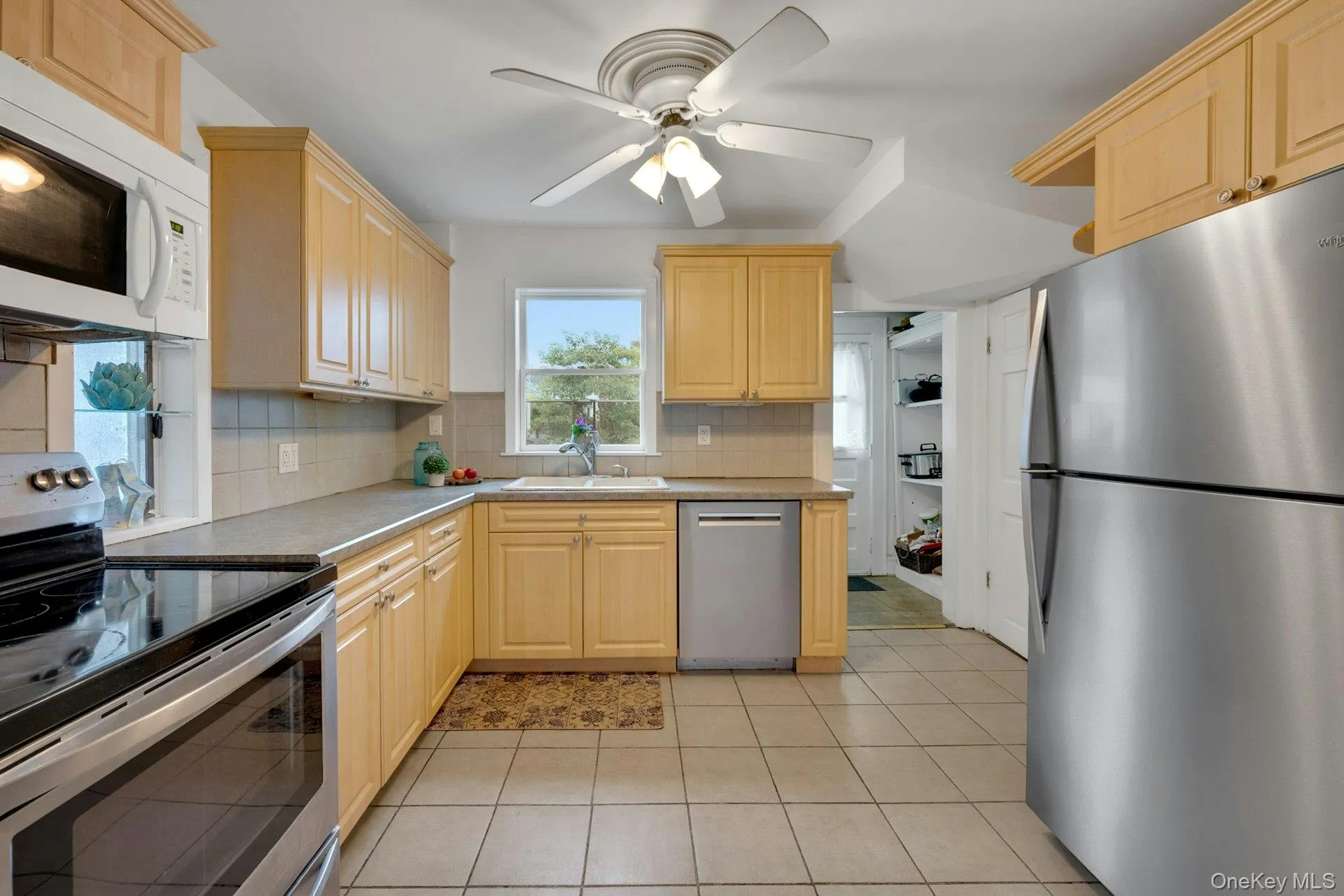 Kitchen with stainless steel appliances Kitchen with stainless steel appliances