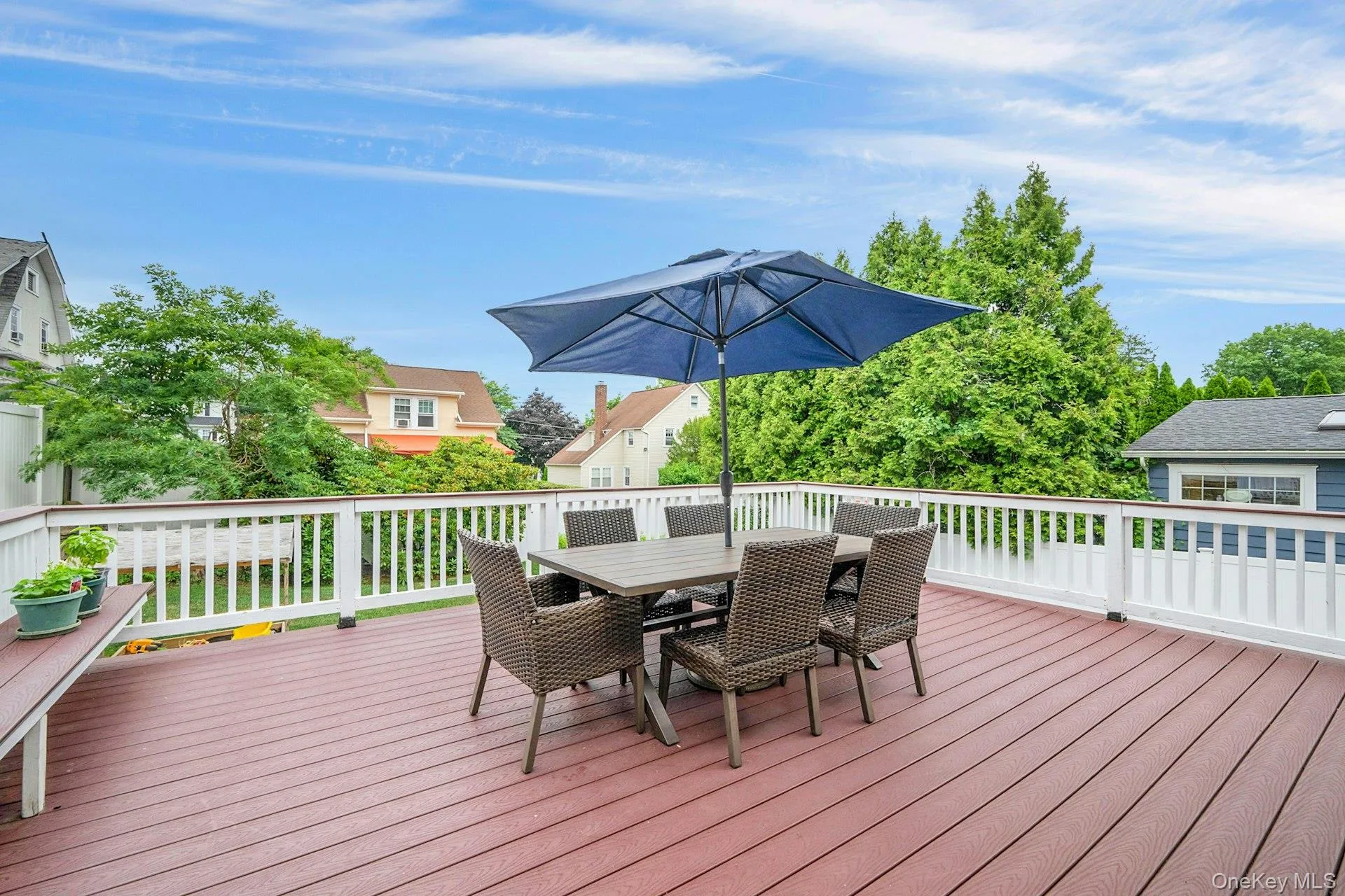 Large deck overlooking backyard Large deck overlooking backyard