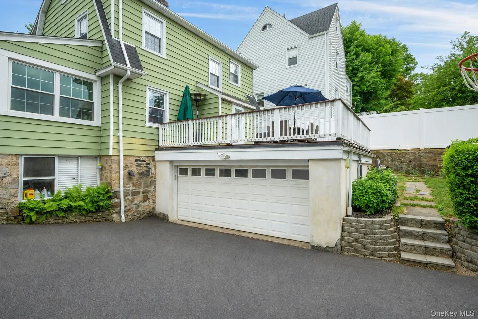 Sizeable driveway leading to two-car garage Sizeable driveway leading to two-car garage