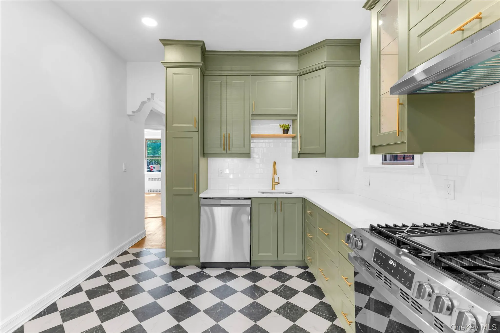 Upper level custom eat-in kitchen with stainless steel appliances Upper level custom eat-in kitchen with stainless steel appliances