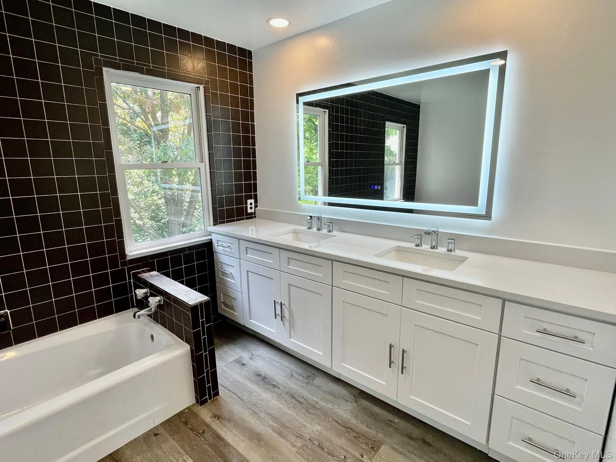 Primary bathroom with double sink vanity Primary bathroom with double sink vanity