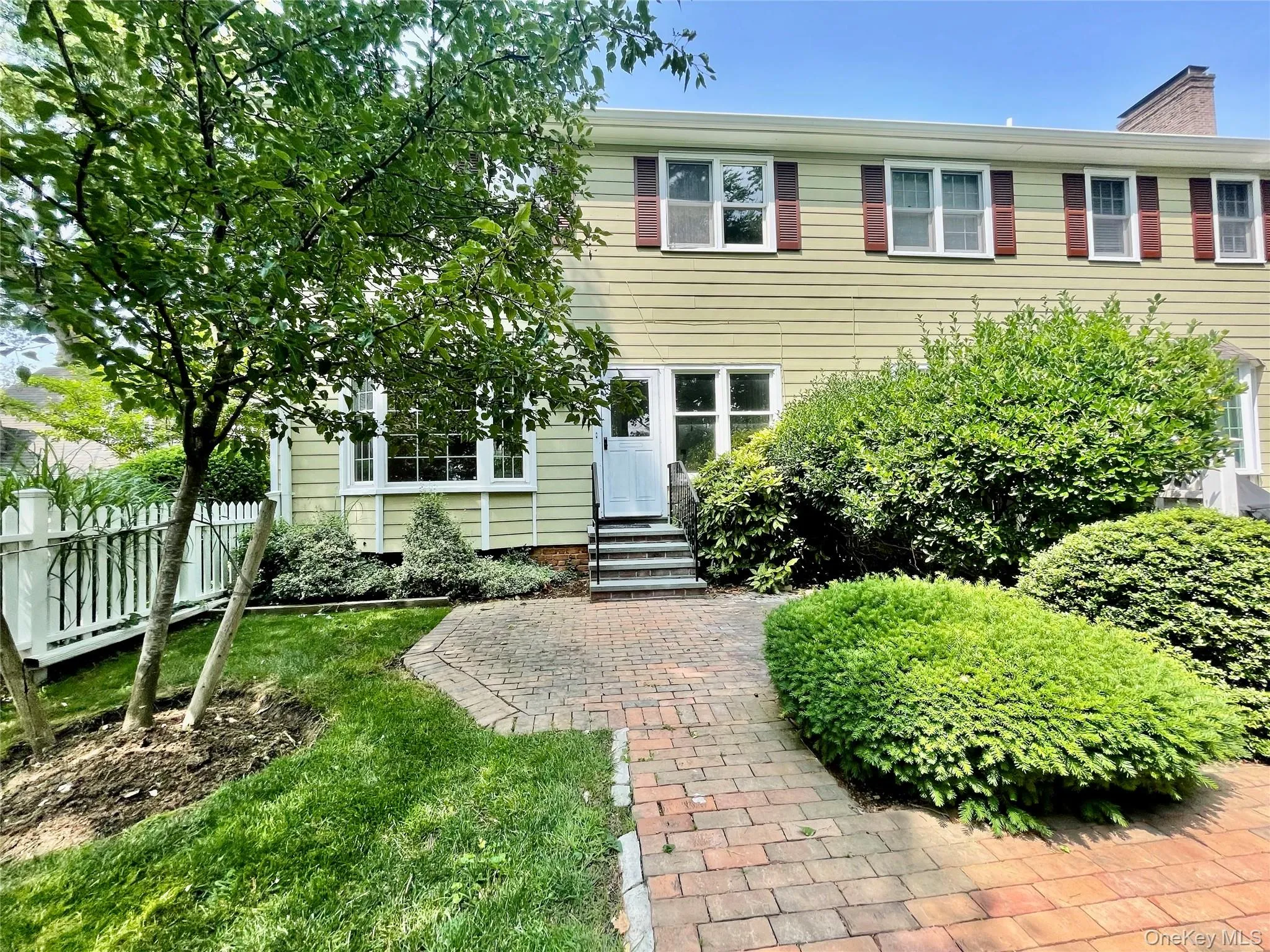 Private backyard with brick patio. Landscaping and snow removal included. Private backyard with brick patio. Landscaping and snow removal included.