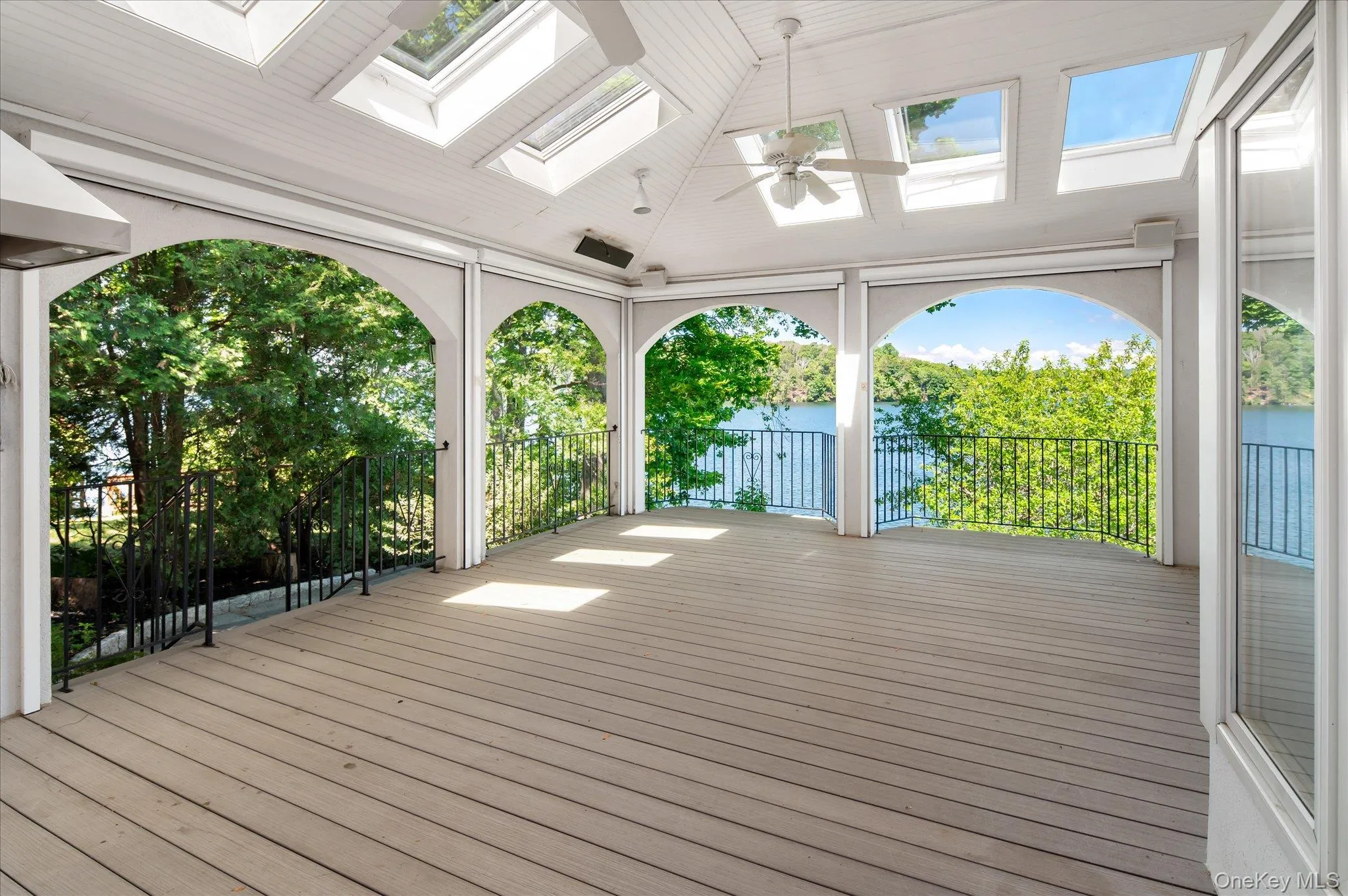 The indoor/outdoor living space on Lake Mahopac, where the screens vanish and the lake comes in The indoor/outdoor living space on Lake Mahopac, where the screens vanish and the lake comes in