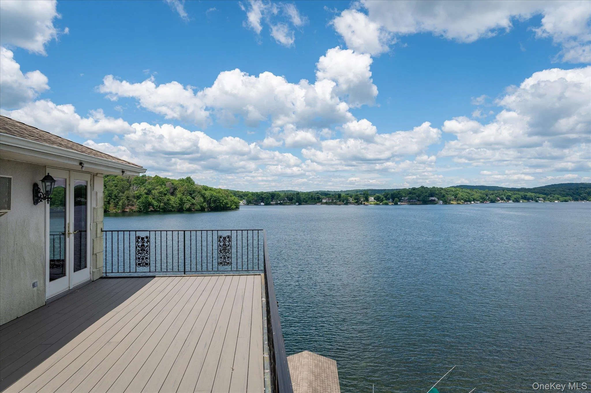 A private deck suspended above Lake Mahopac, where the views stretch as far as the eye can see A private deck suspended above Lake Mahopac, where the views stretch as far as the eye can see