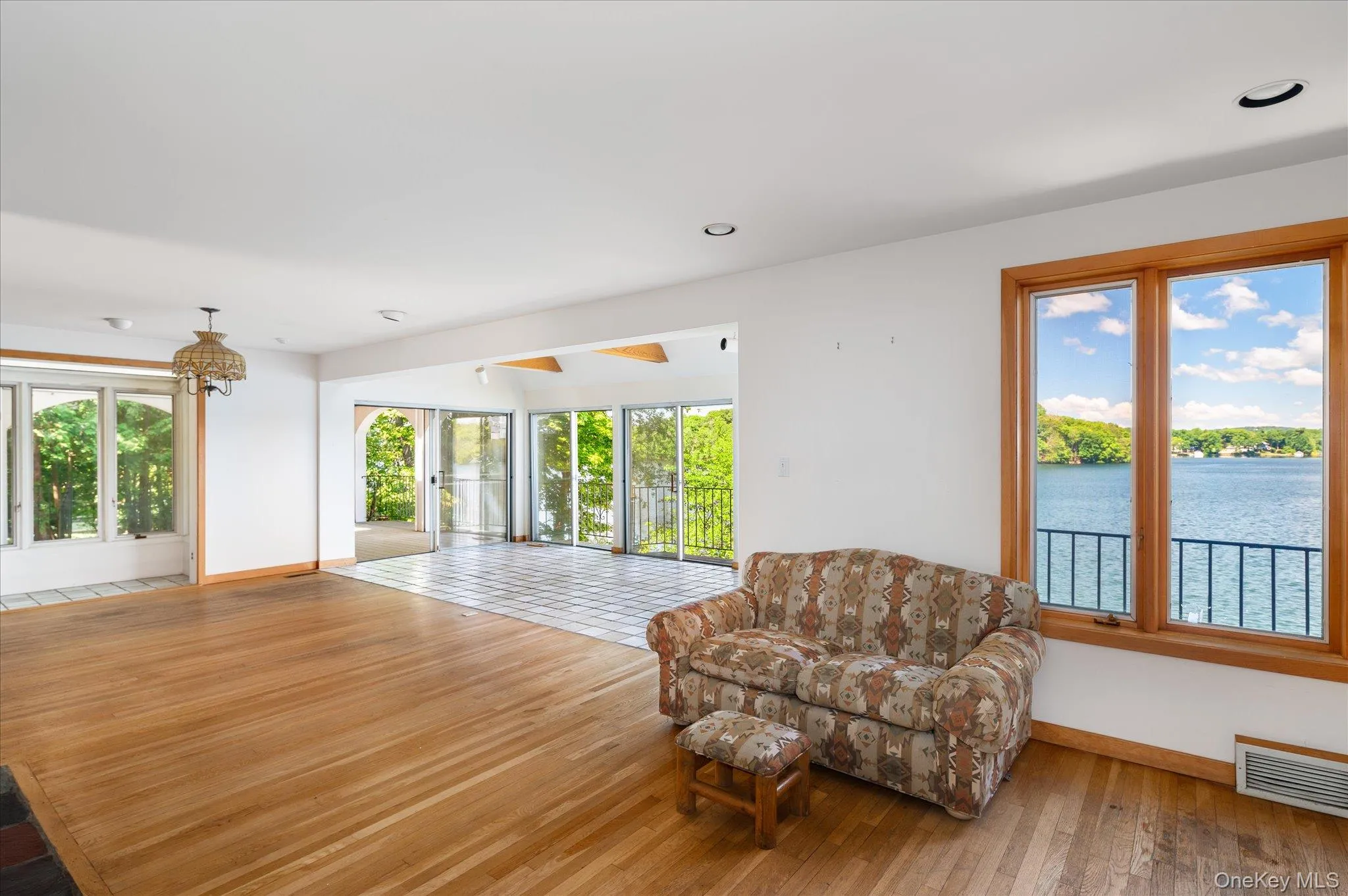 A stone fireplace on one side and Lake Mahopac on the other, the heart of this waterfront home A stone fireplace on one side and Lake Mahopac on the other, the heart of this waterfront home