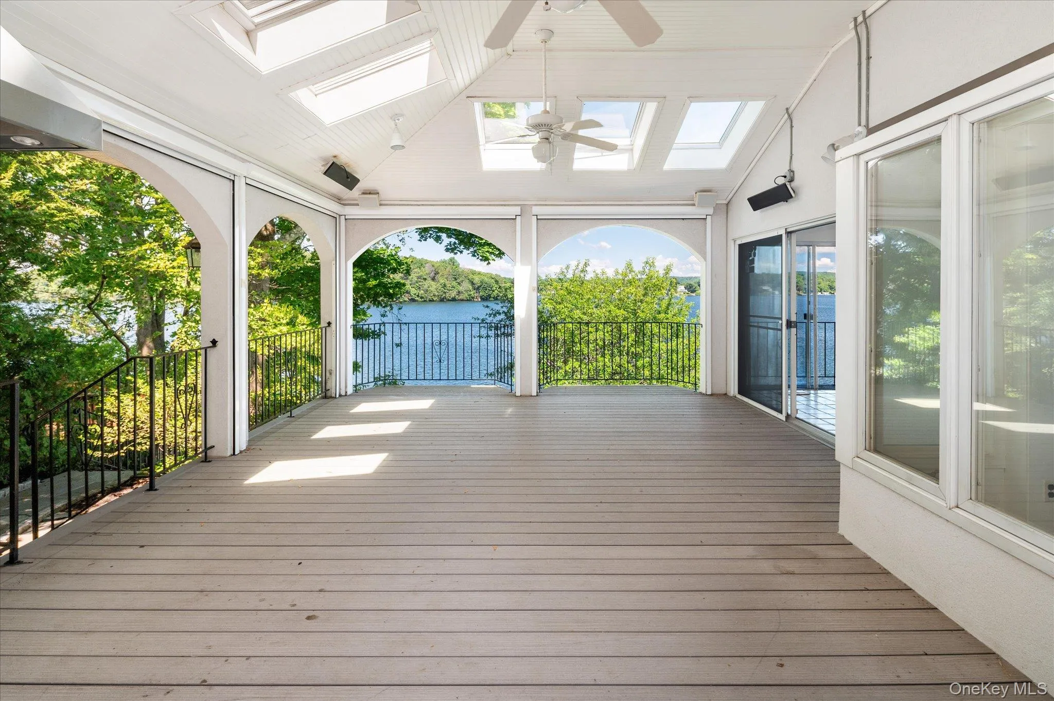 An outdoor retreat spanning the full side of this Lake Mahopac waterfront home An outdoor retreat spanning the full side of this Lake Mahopac waterfront home