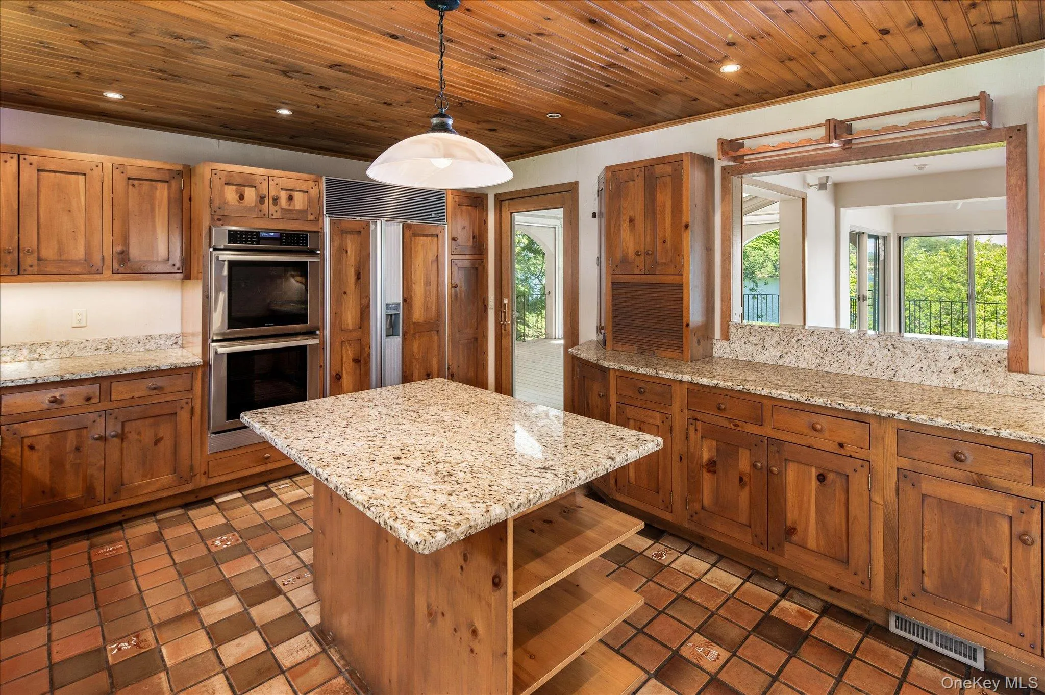 The kitchen centers around a generous island where everyone naturally gathers The kitchen centers around a generous island where everyone naturally gathers