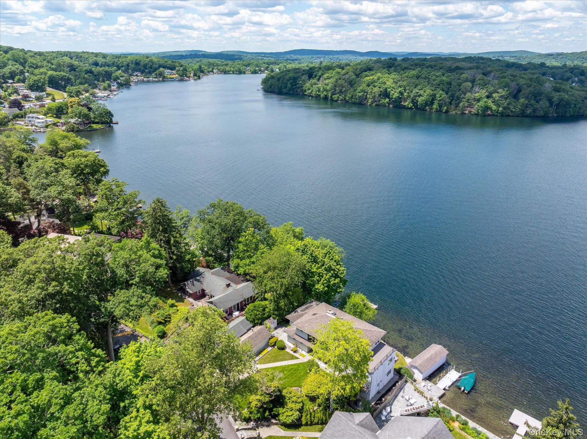 Open water stretches across Lake Mahopac from this rare Mahopac Point waterfront address Open water stretches across Lake Mahopac from this rare Mahopac Point waterfront address