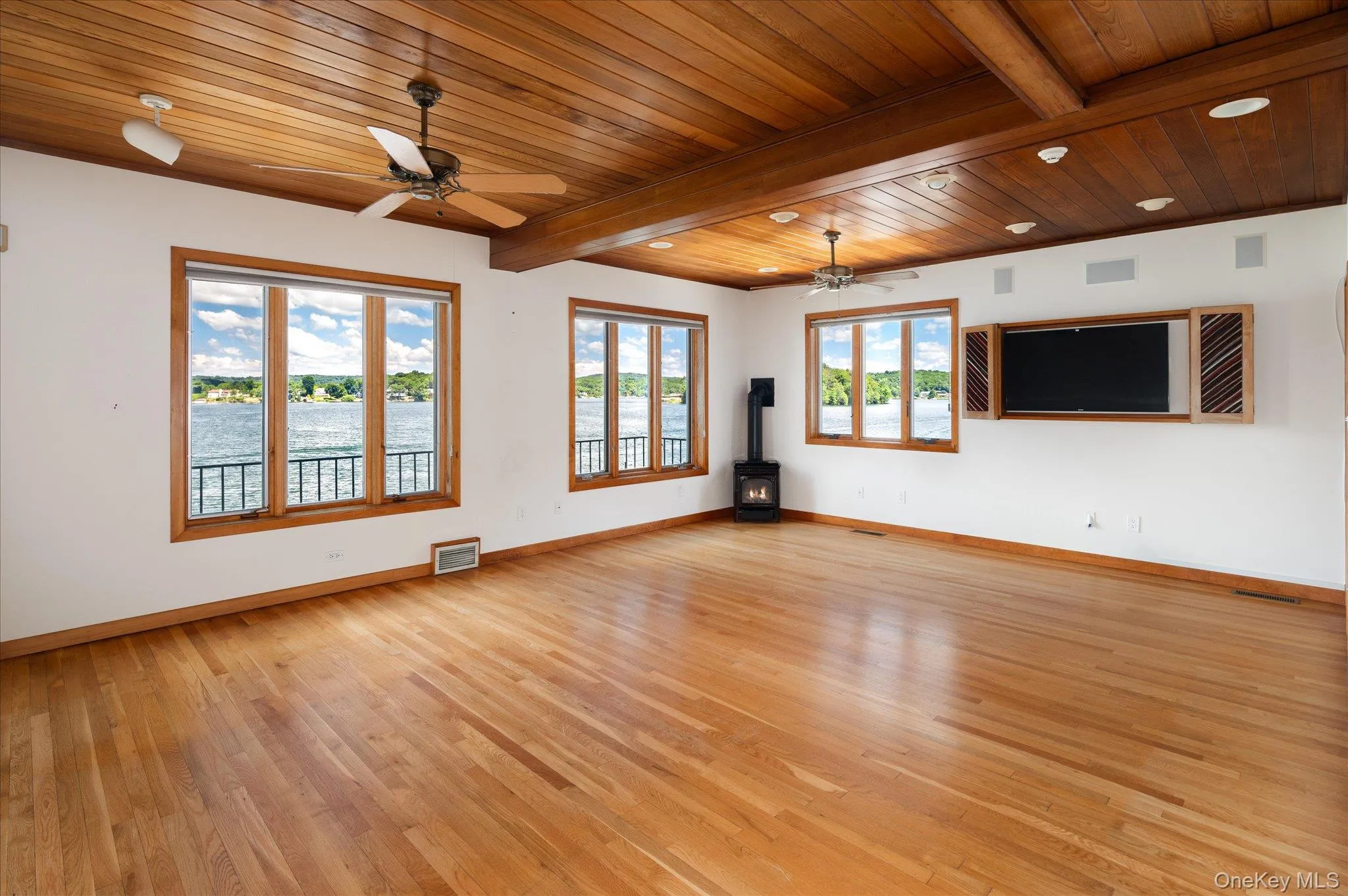 The primary suite offers single floor living with stunning Lake Mahopac views The primary suite offers single floor living with stunning Lake Mahopac views