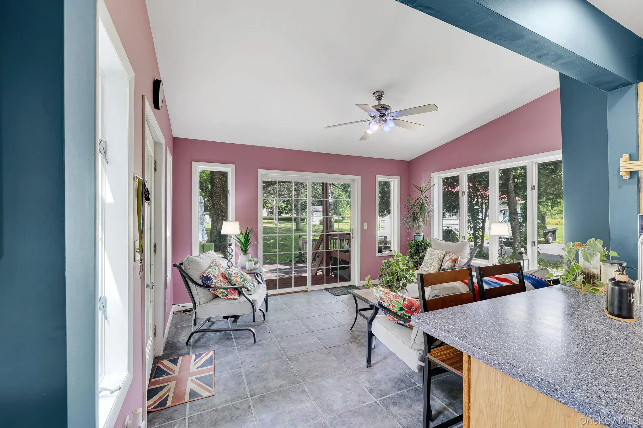 Dining Room/Sunroom with sliders to the deck Dining Room/Sunroom with sliders to the deck