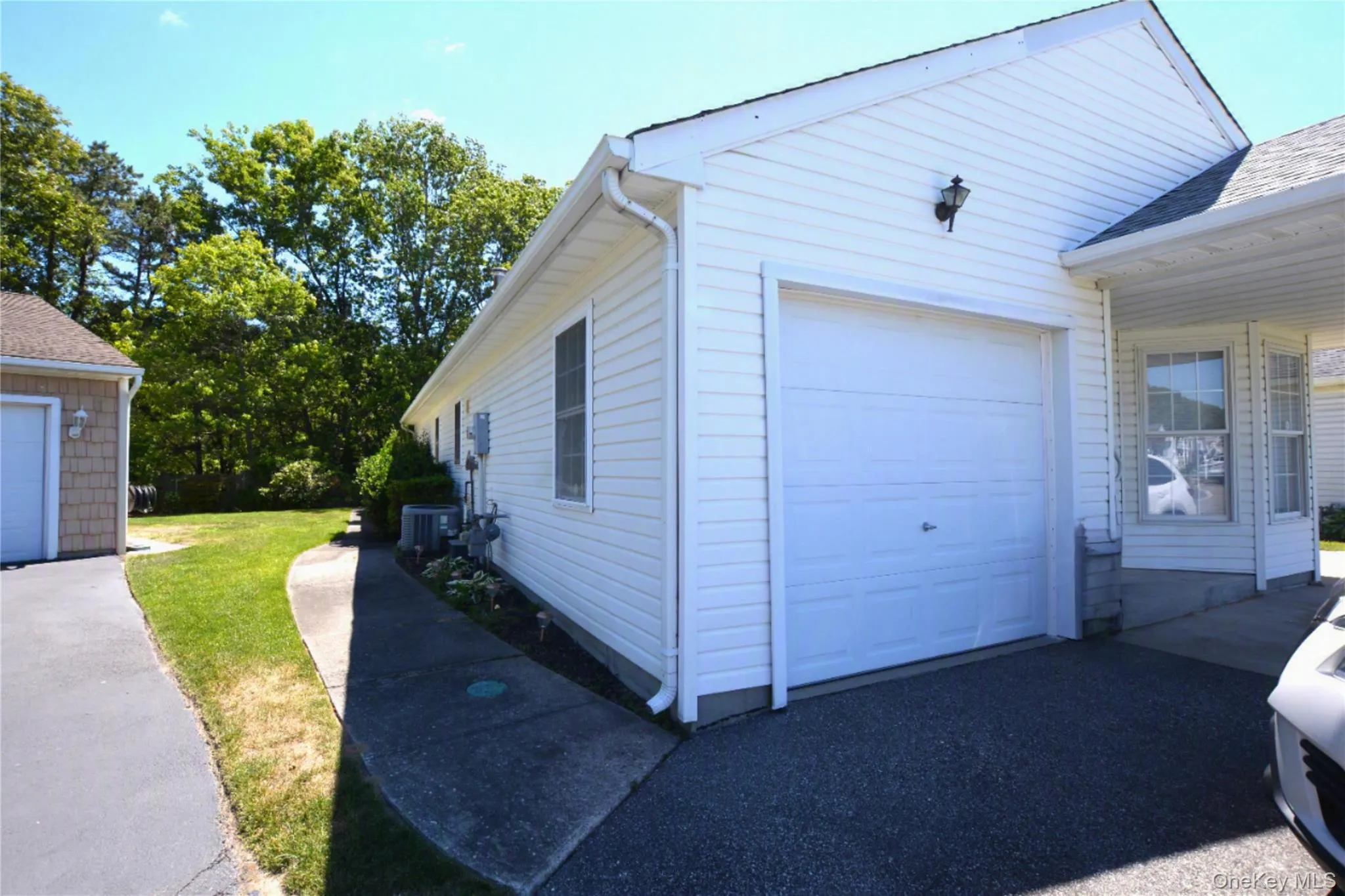 Garage and private driveway Garage and private driveway