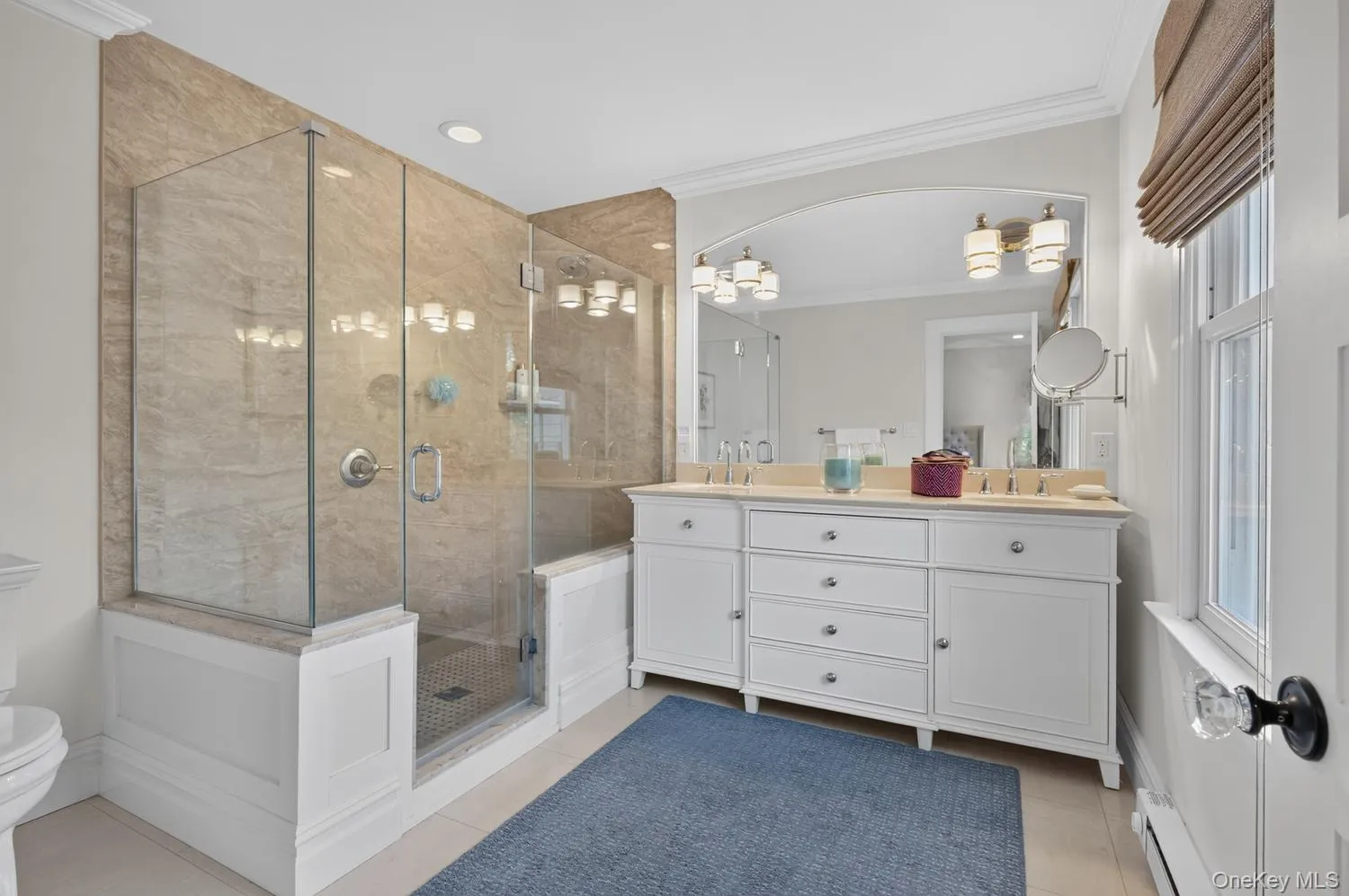 Oversized shower and double sink. Oversized shower and double sink.