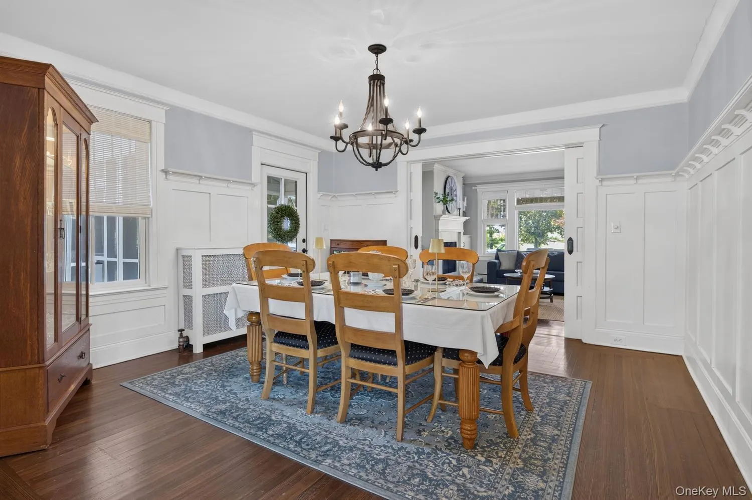With beautiful woodwork. Entrance to the kitchen and screened in porch With beautiful woodwork. Entrance to the kitchen and screened in porch