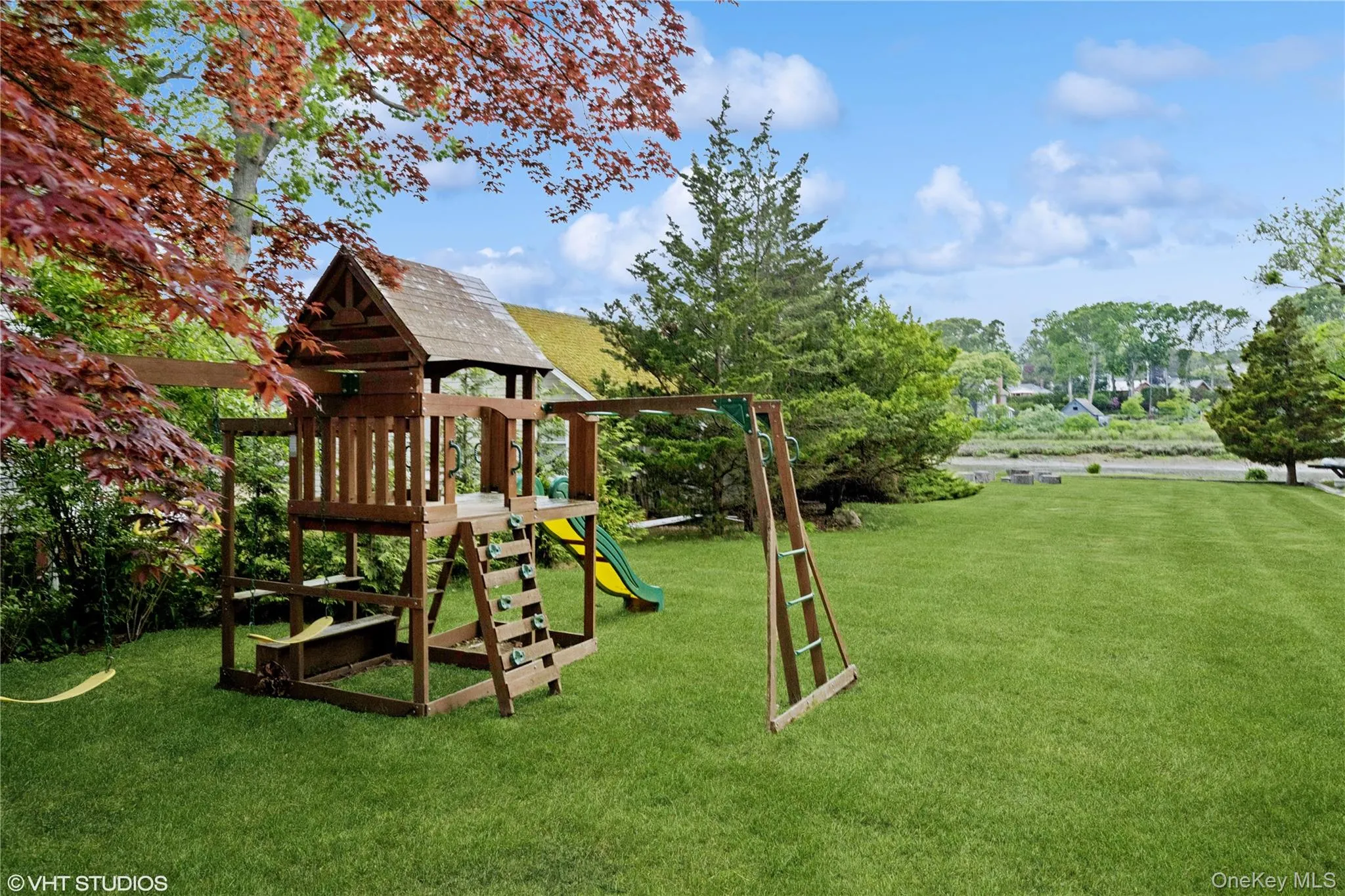 View of play area with a lawn View of play area with a lawn