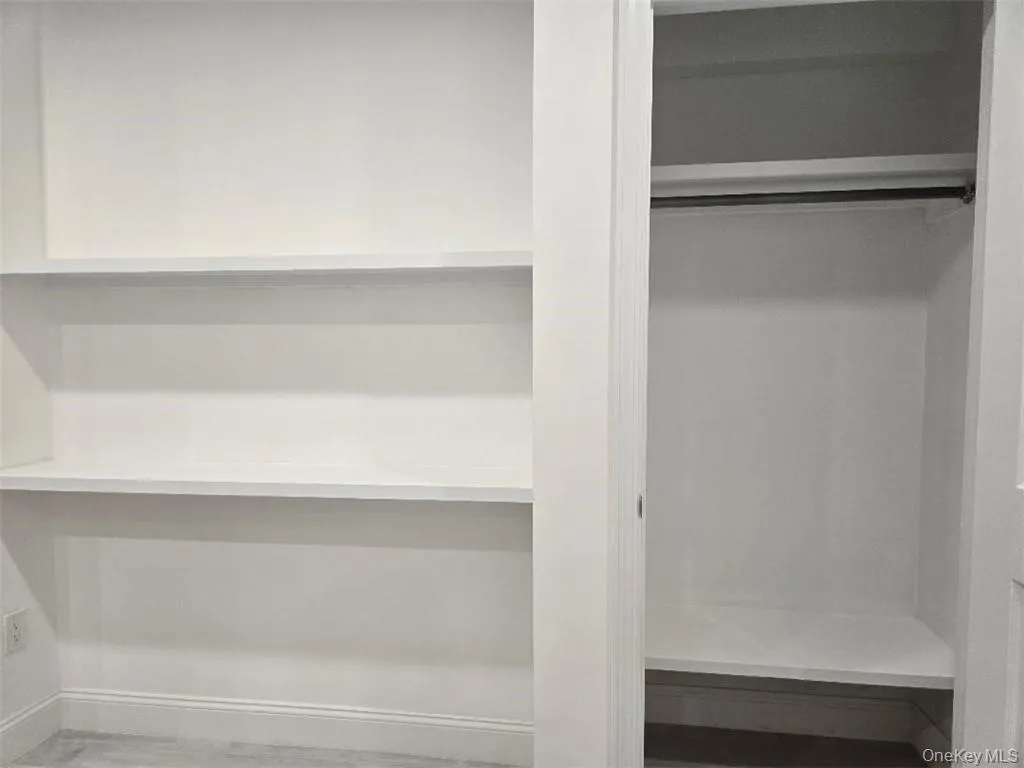 View of closet and pantry shelving. View of closet and pantry shelving.