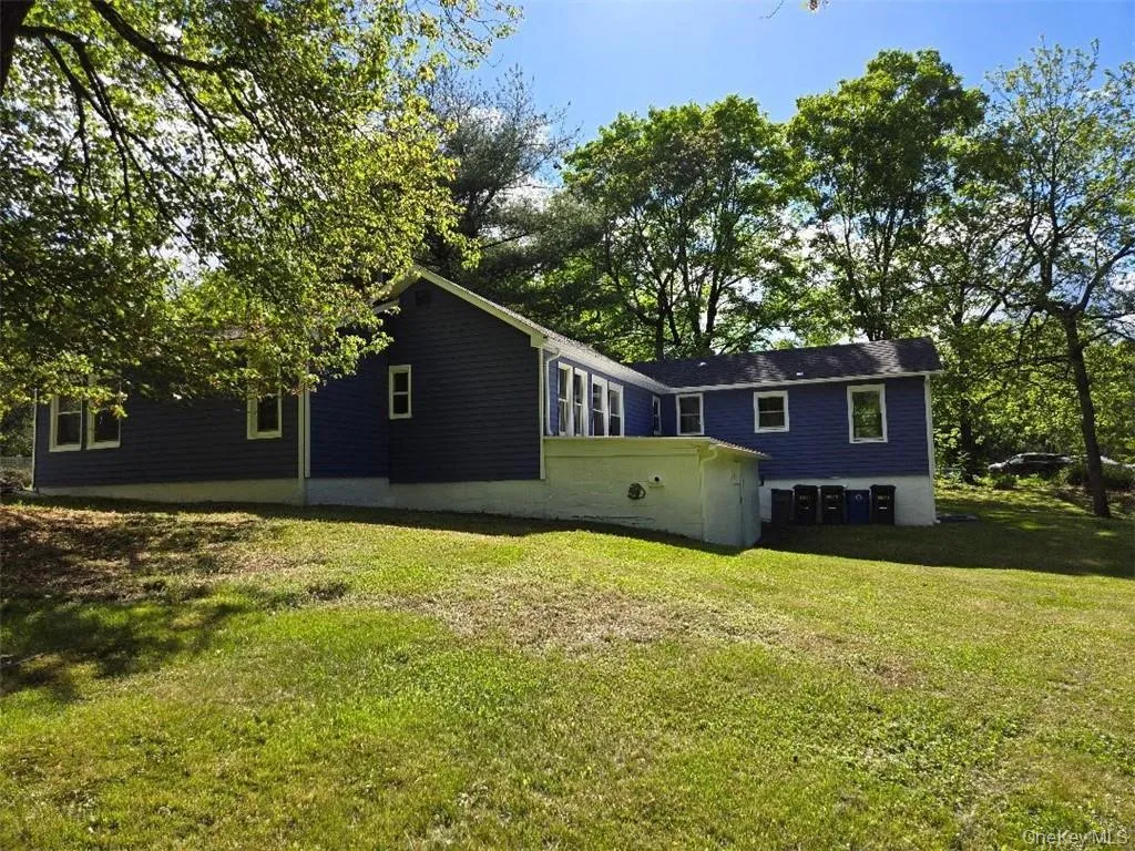 View of the spacious backyard, showing the storage room. View of the spacious backyard, showing the storage room.