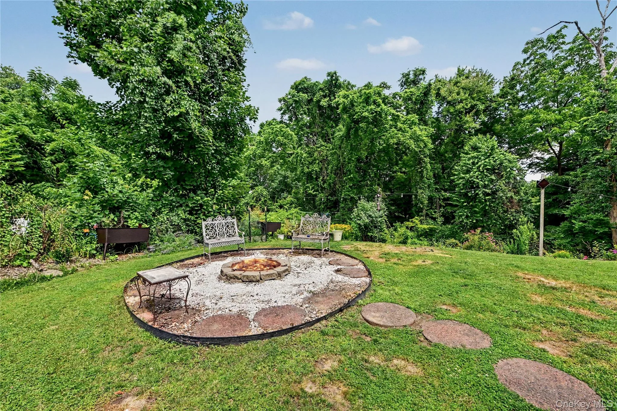 Fire pit sitting area. Fire pit sitting area.