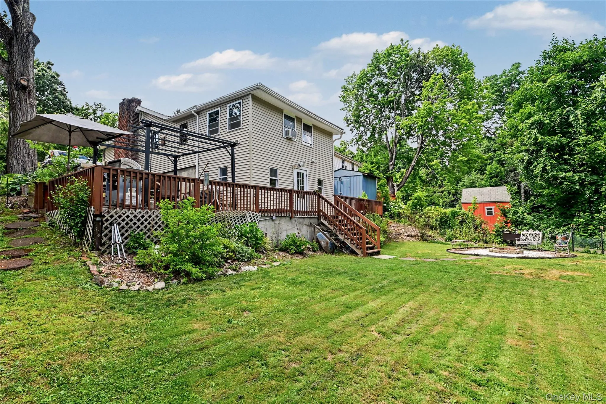 View of beautiful landscaped property. View of beautiful landscaped property.