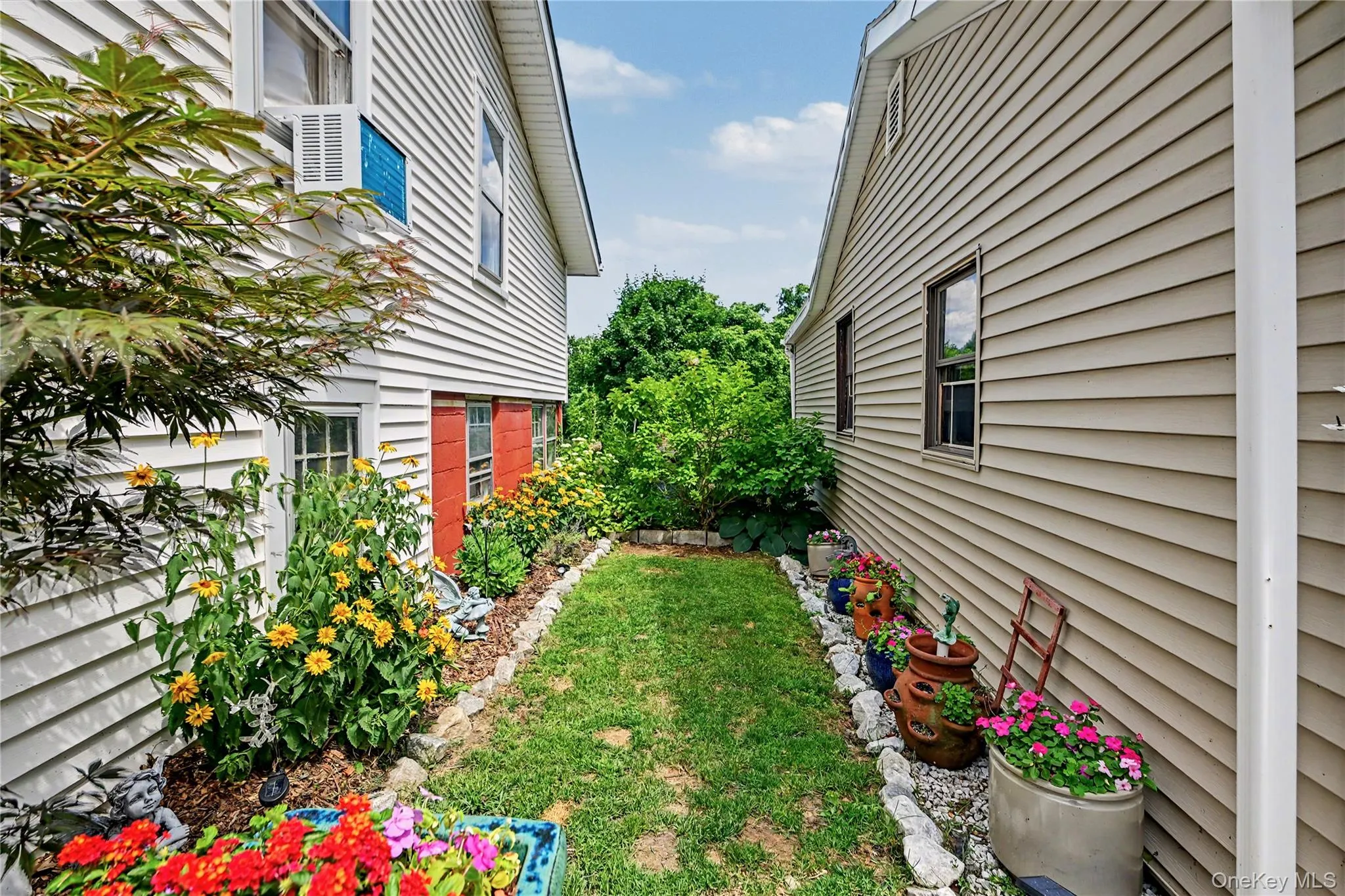 Side yard with gardens Side yard with gardens