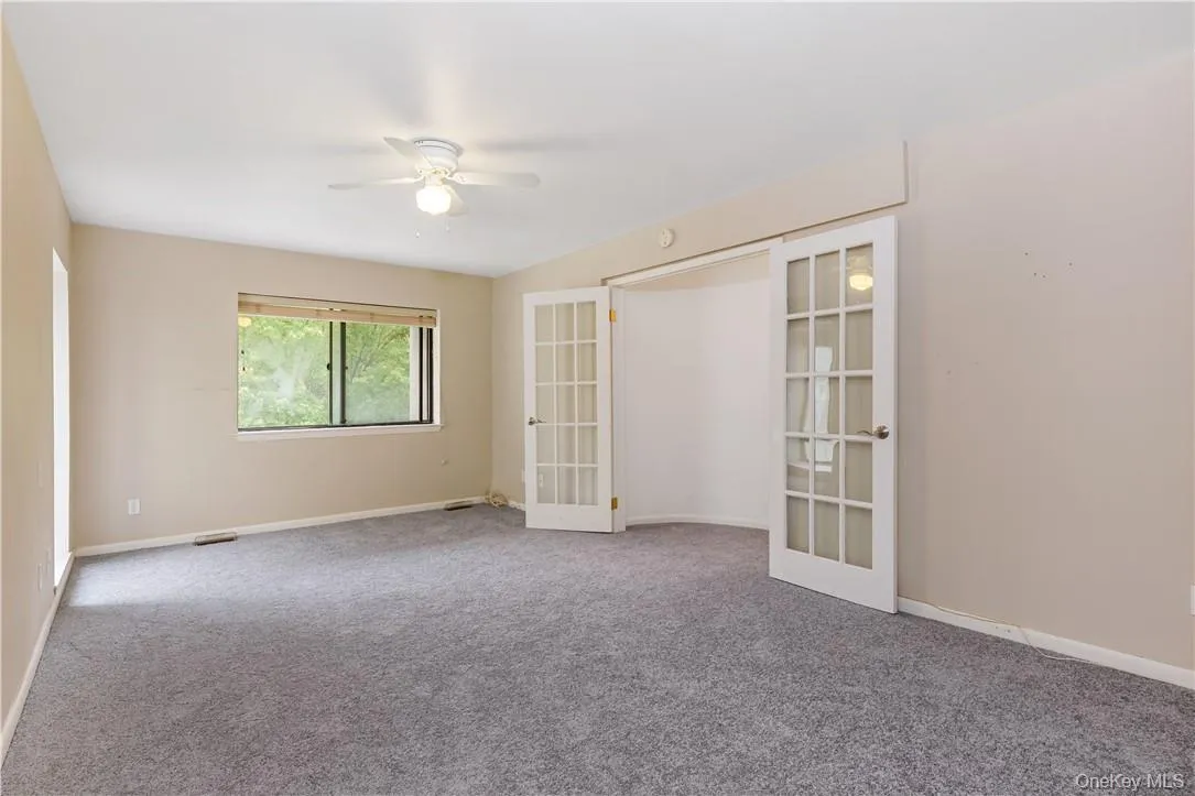 Private Primary Bedroom with french doors. Private Primary Bedroom with french doors.