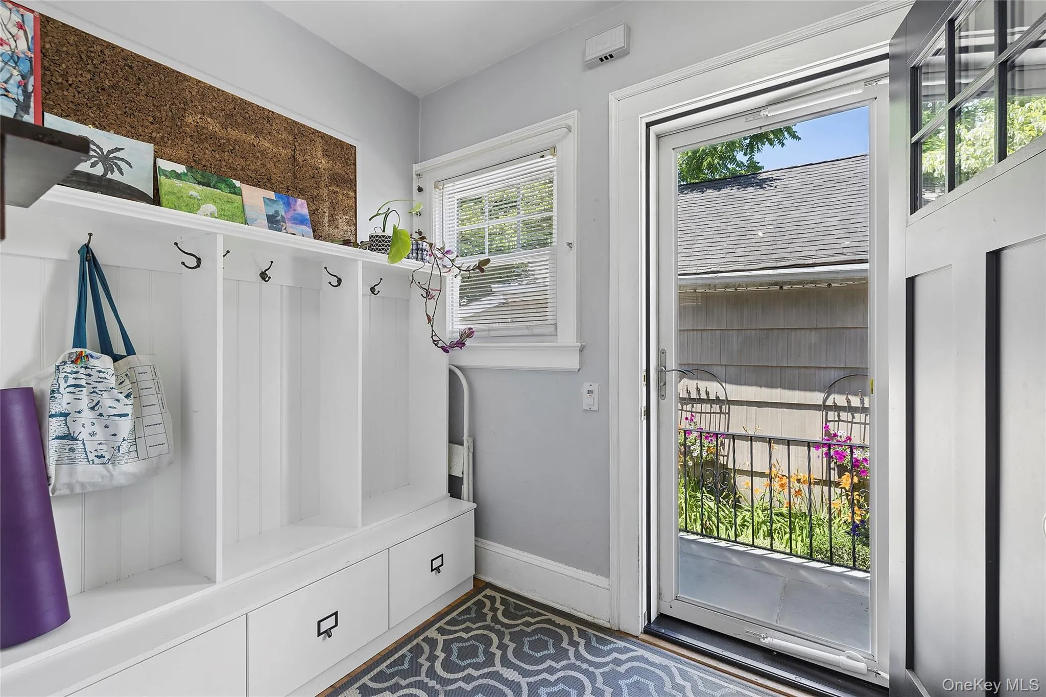 Mudroom with storage off backdoor of house Mudroom with storage off backdoor of house