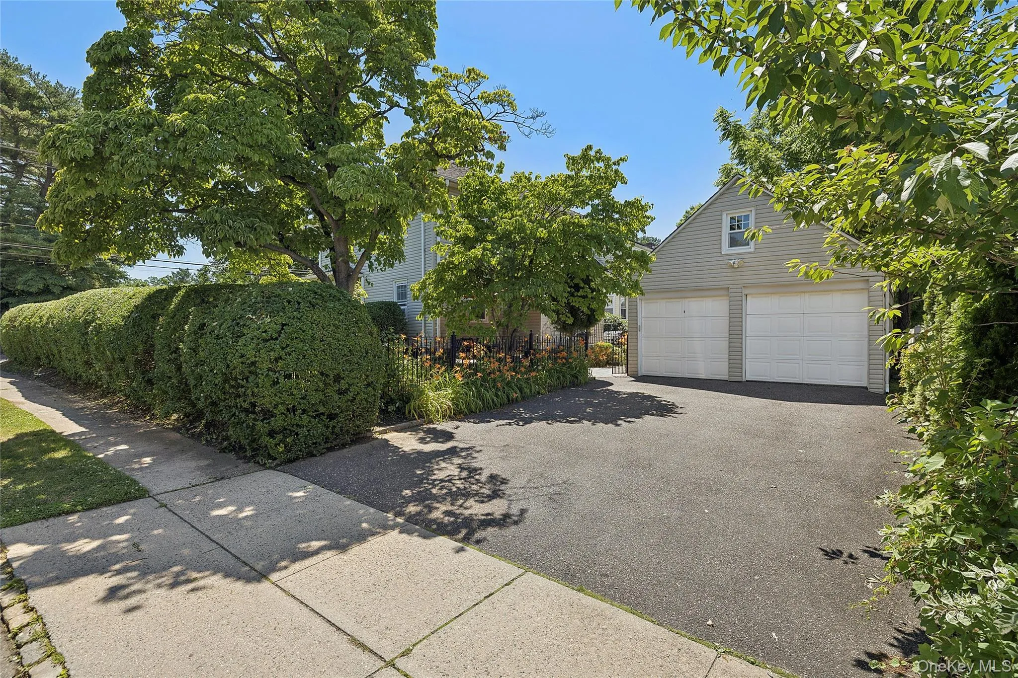 Two Car garage with large driveway Two Car garage with large driveway