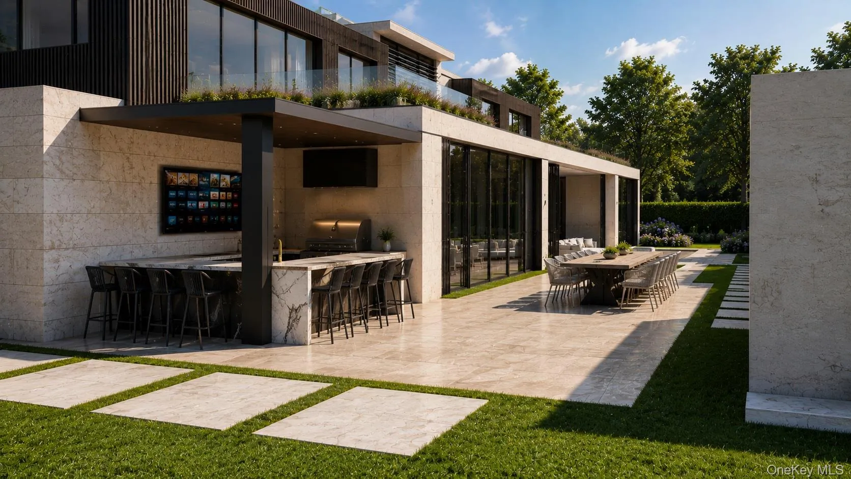 Expansive outdoor living area featuring a covered bar with stone countertops, an integrated outdoor kitchen, and a large patio Expansive outdoor living area featuring a covered bar with stone countertops, an integrated outdoor kitchen, and a large patio