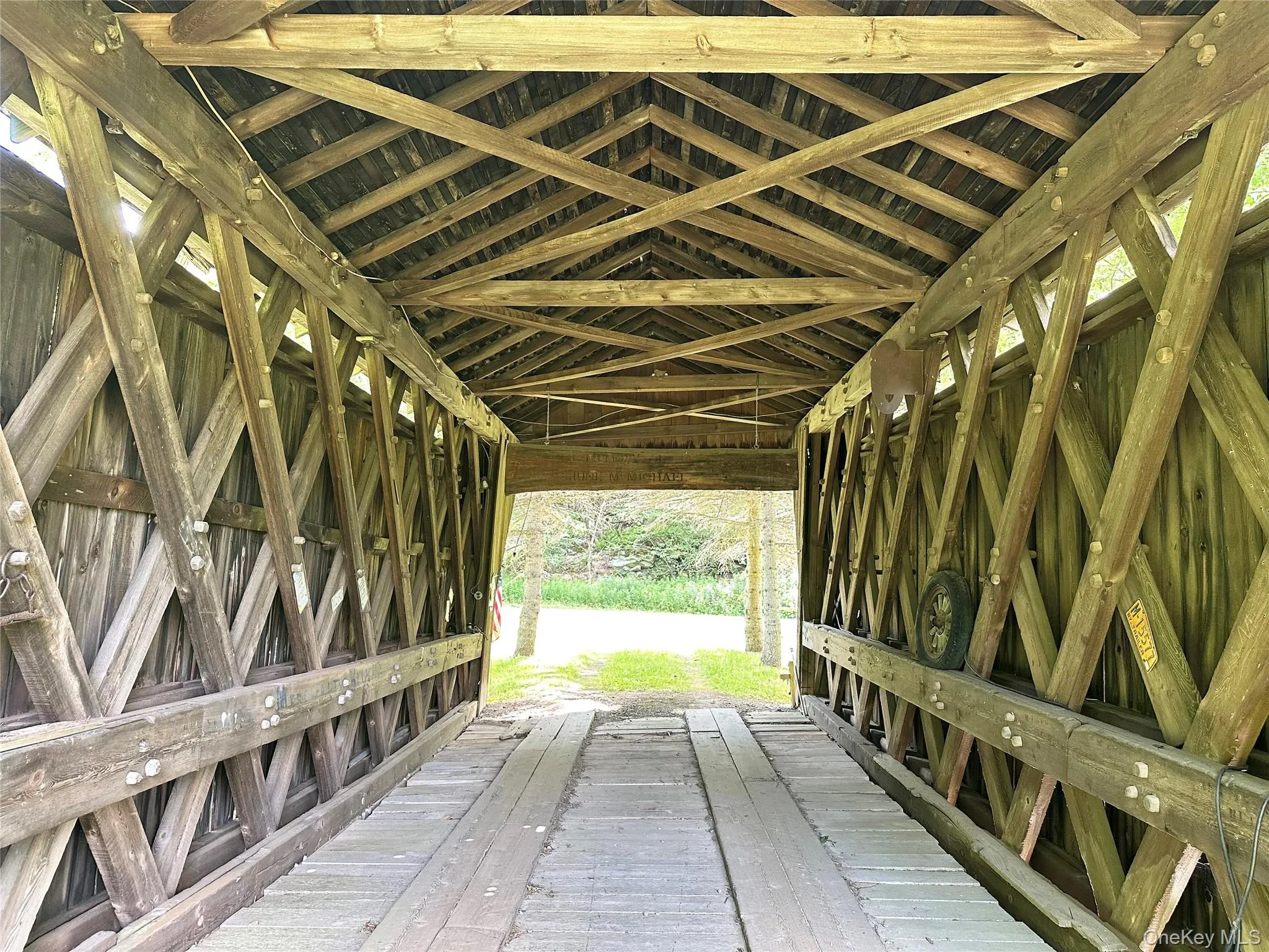 Interior of the historic Campbell Covered Bridge showcasing its original timber truss construction and remarkable historic character. Interior of the historic Campbell Covered Bridge showcasing its original timber truss construction and remarkable historic character.