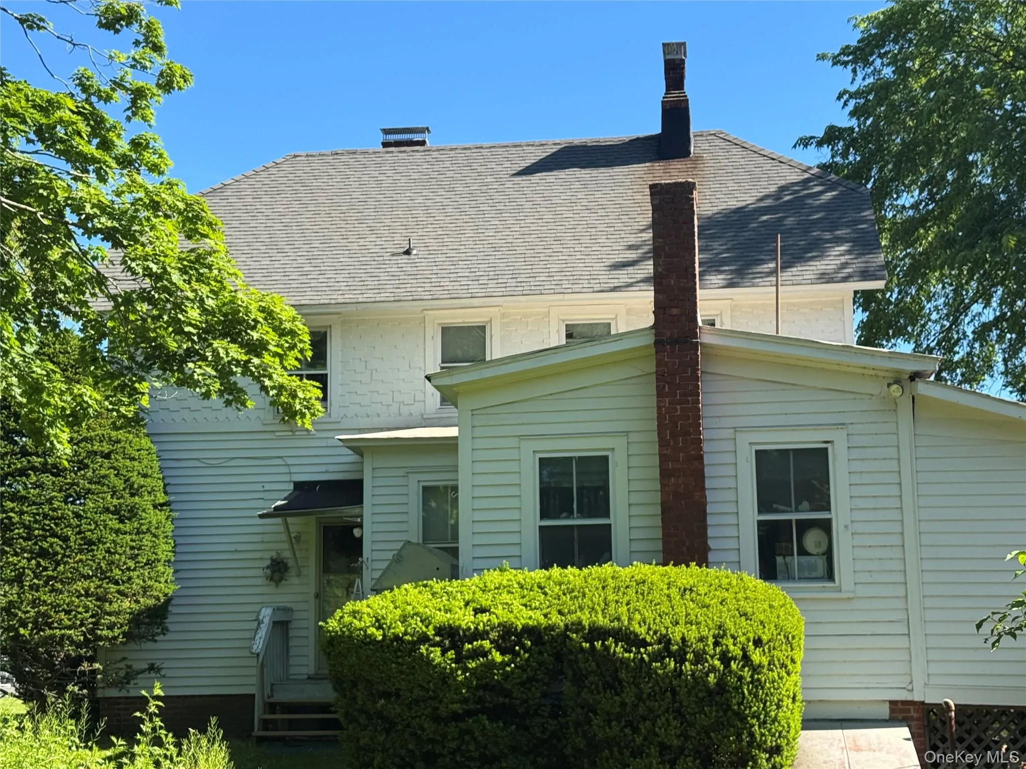 Legal 4 family home on the property. Legal 4 family home on the property.